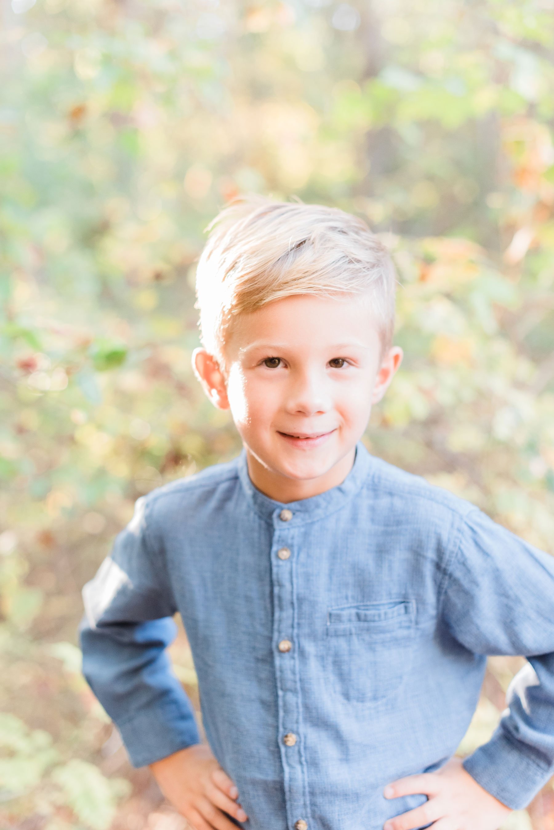  A little boy dresses in a light blue shirt to match the color palette for a family photo session by Atlanta-based photographer, Jacquie Erickson Atlanta Georgia Peachtree City Fayetteville Senoia photo color palette #photoshootoutfits #photocolorpal
