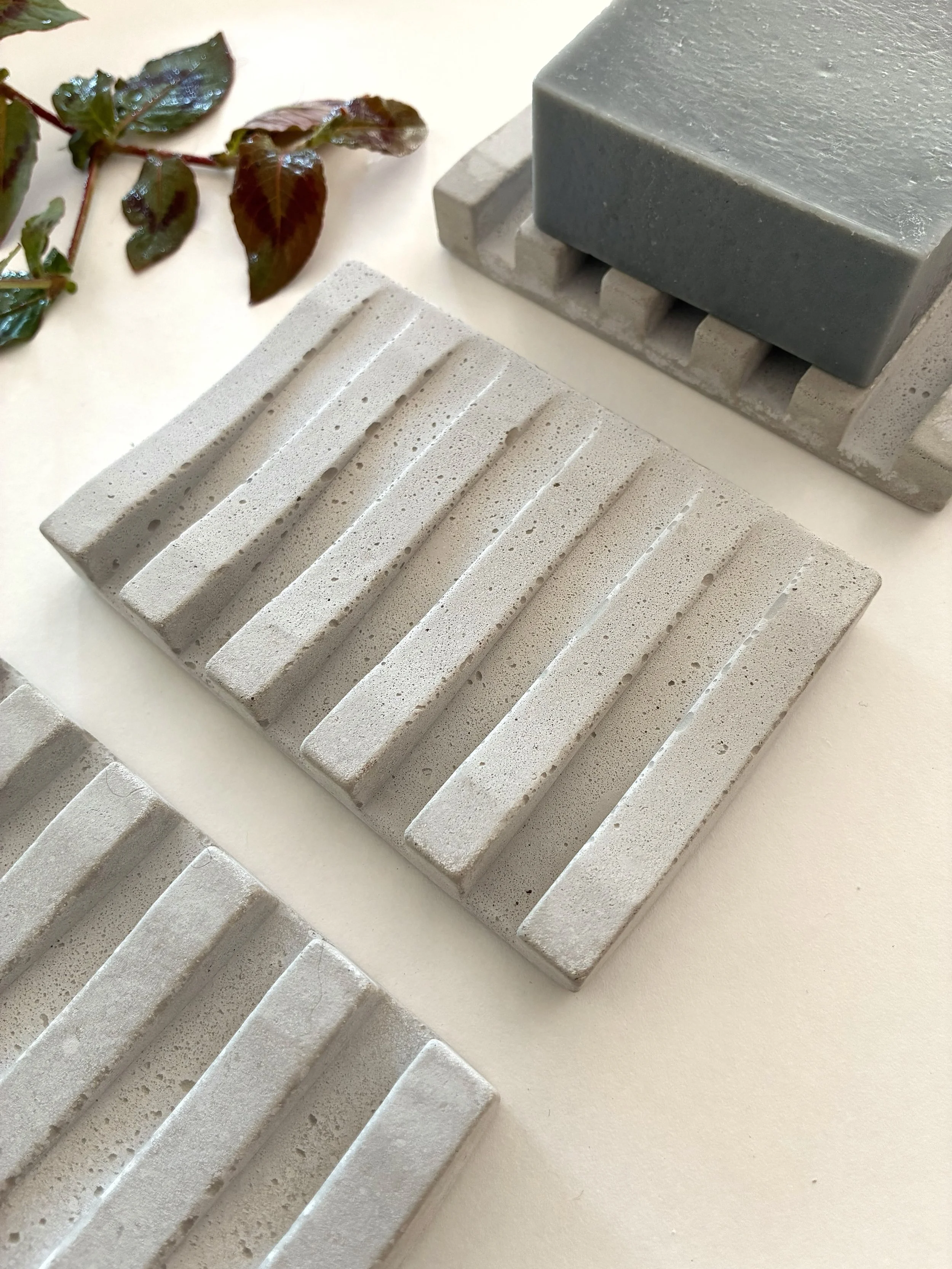 Concrete Soap Dish

🌼 Modern design 
🌼 Handcrafted in hard wearing concrete 
🌼 Fits regular soap bar
🌼 Soft grey colour. When wet a darker grey
🌼 Self draining - angle slopes

&bull;
&bull;
&bull;
#soapbars #handmadesoap #soapdish #bathroomdesig