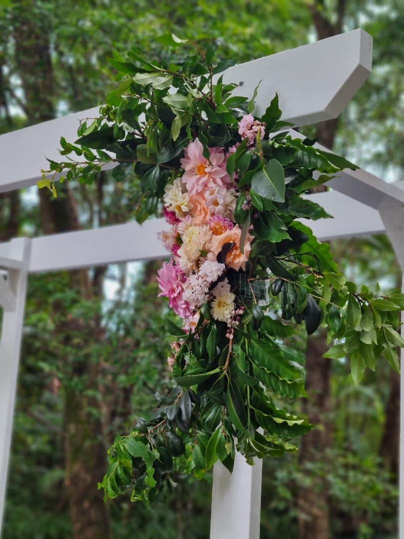 flowers-on-wedding-ceremony-arbor-peachester-stacey-morris-celebrant.jpg