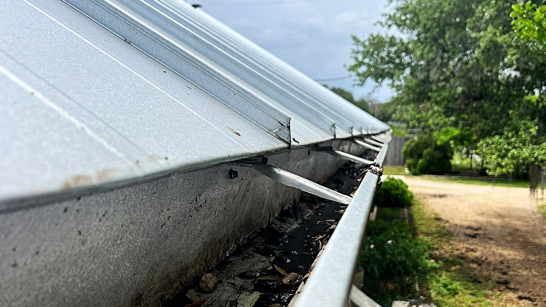 Gutters on a tin roof.