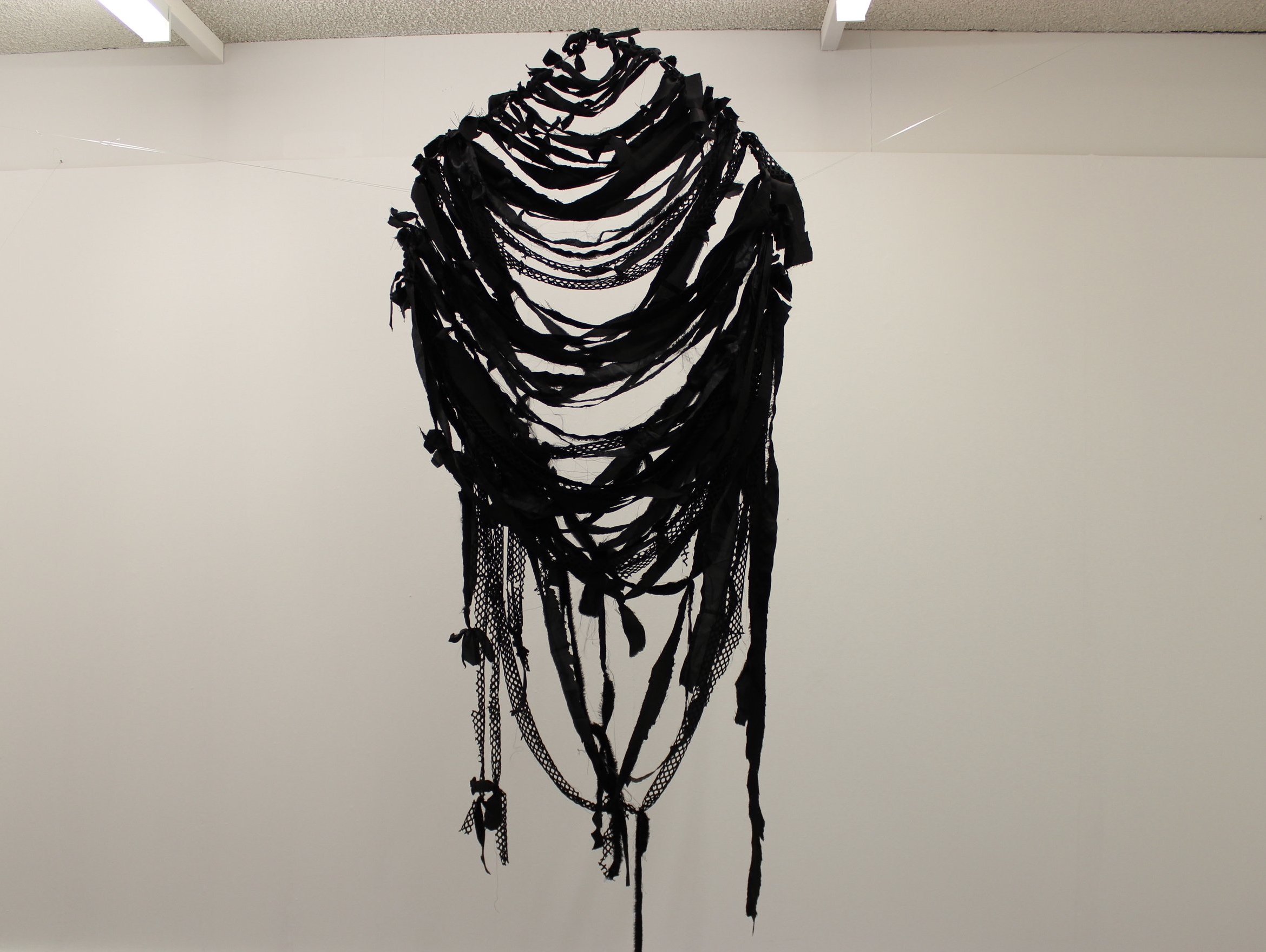 ‘I donno, it’s not so much an emotion but more of an urgency’ 2022, installation view, hand-dyed and recycled fabric, metal