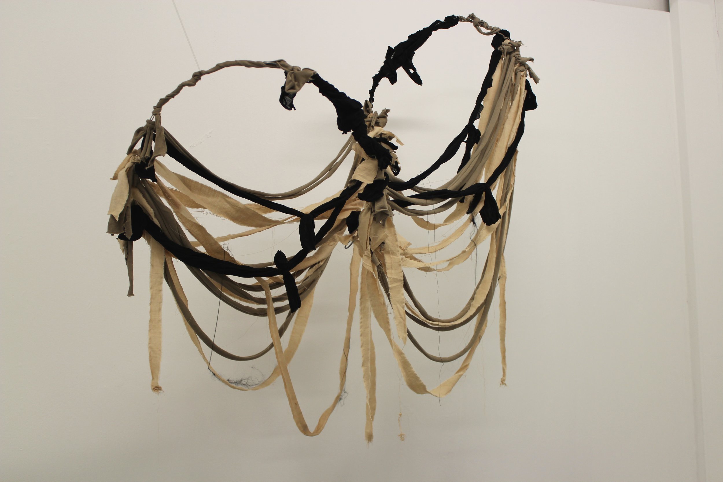 ‘I donno, it’s not so much an emotion but more of an urgency’ 2022, installation view, hand-dyed and recycled fabric, metal
