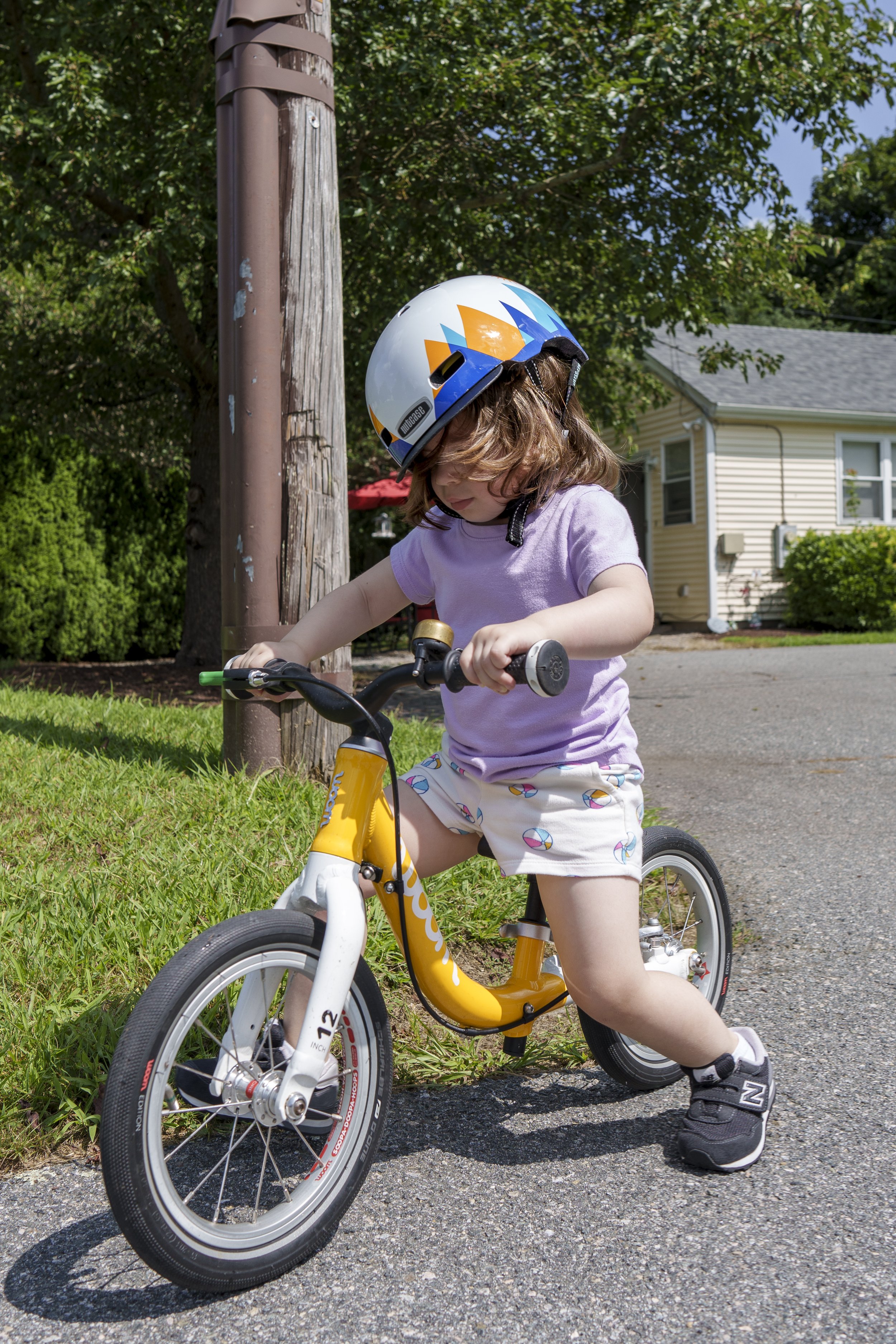 Riding balance bikes at the Cottage, 8/13