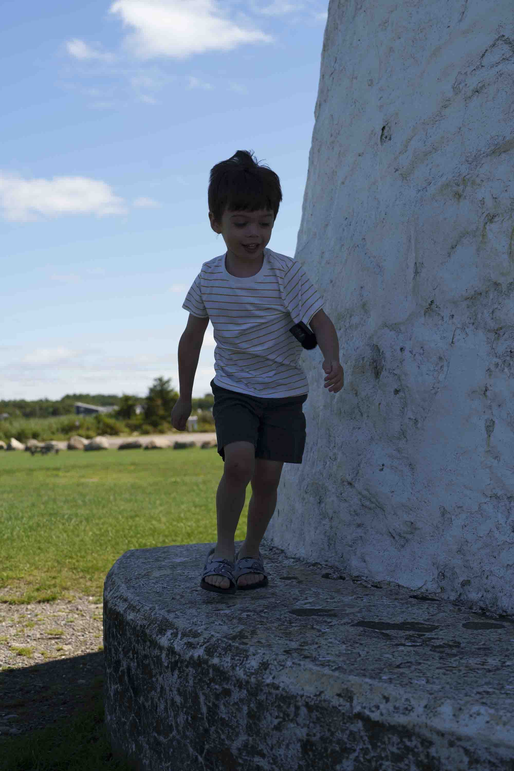 The kids play at Ned's Point Lighthouse during Dad's run. 8/20