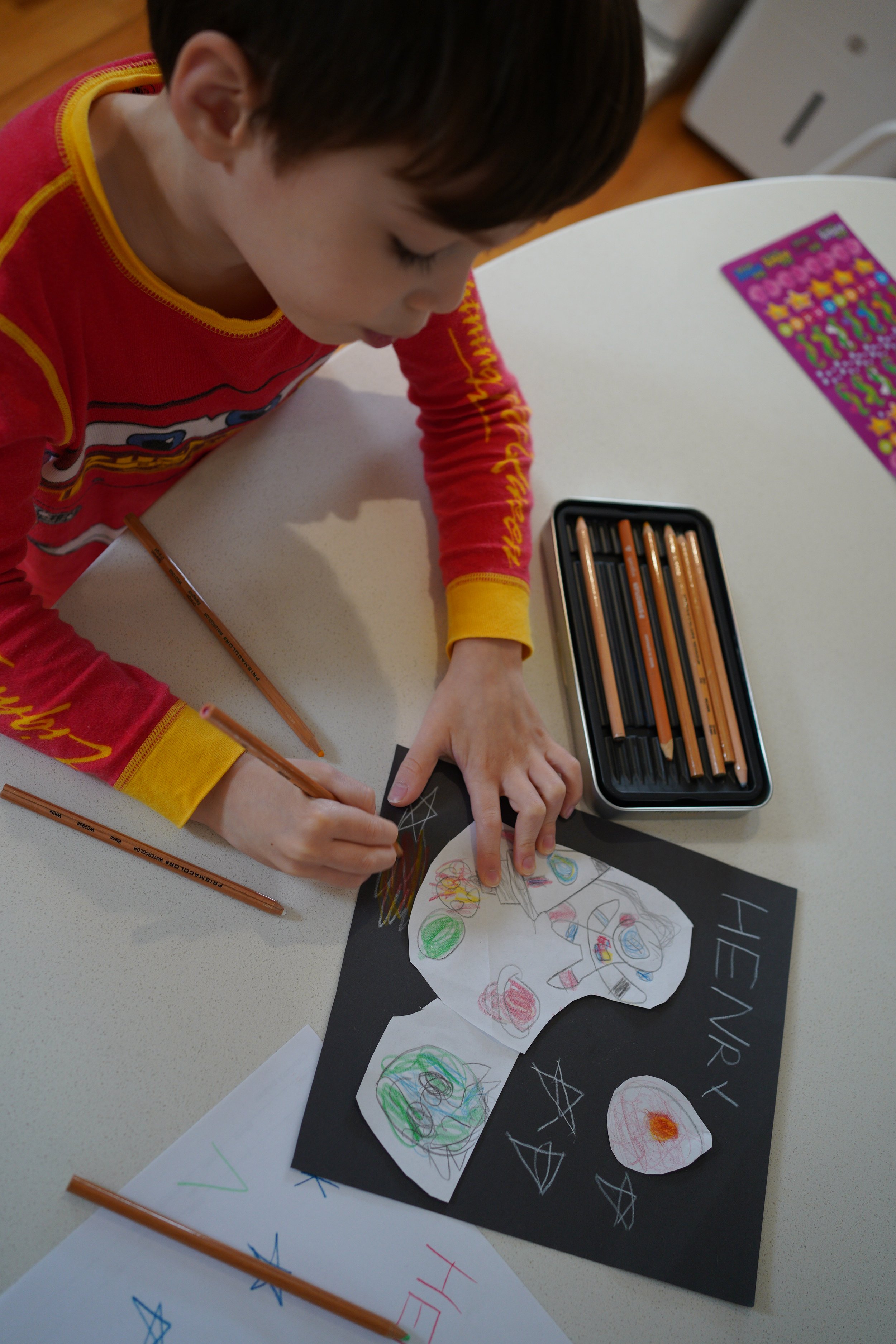 River and Eleanor are making a card for a friend