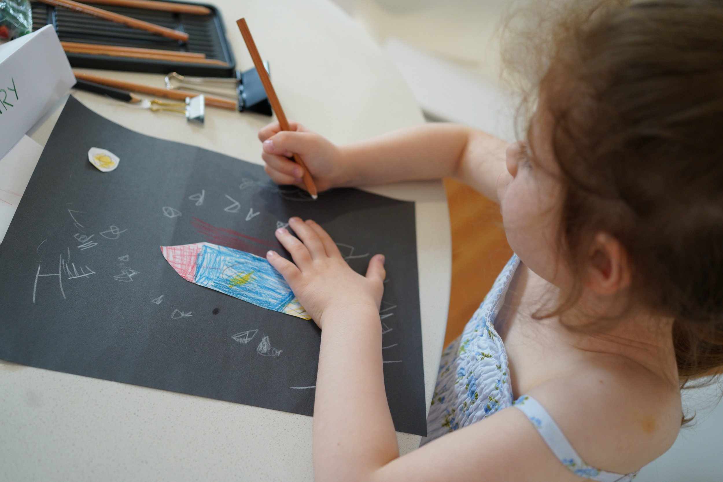 River and Eleanor are making a card for a friend