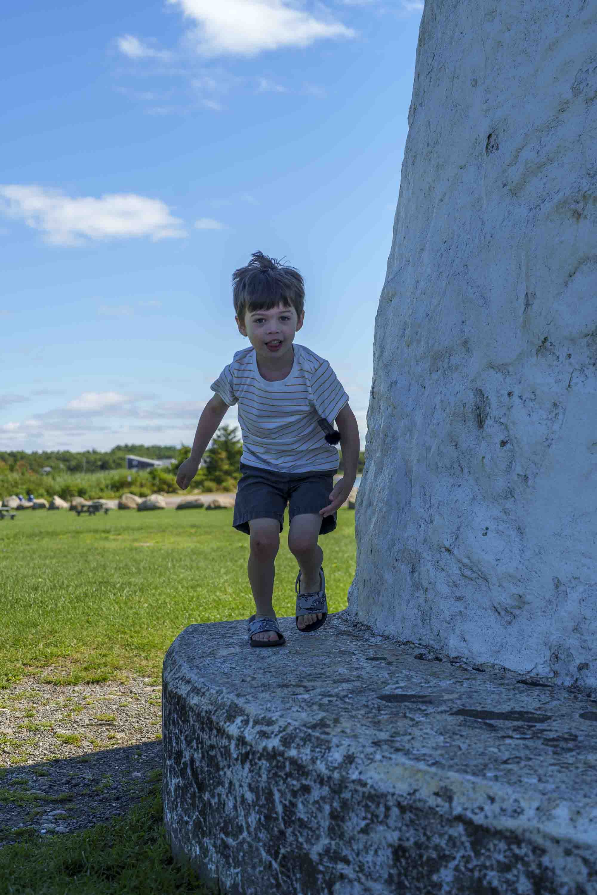 The kids play at Ned's Point Lighthouse during Dad's run. 8/20