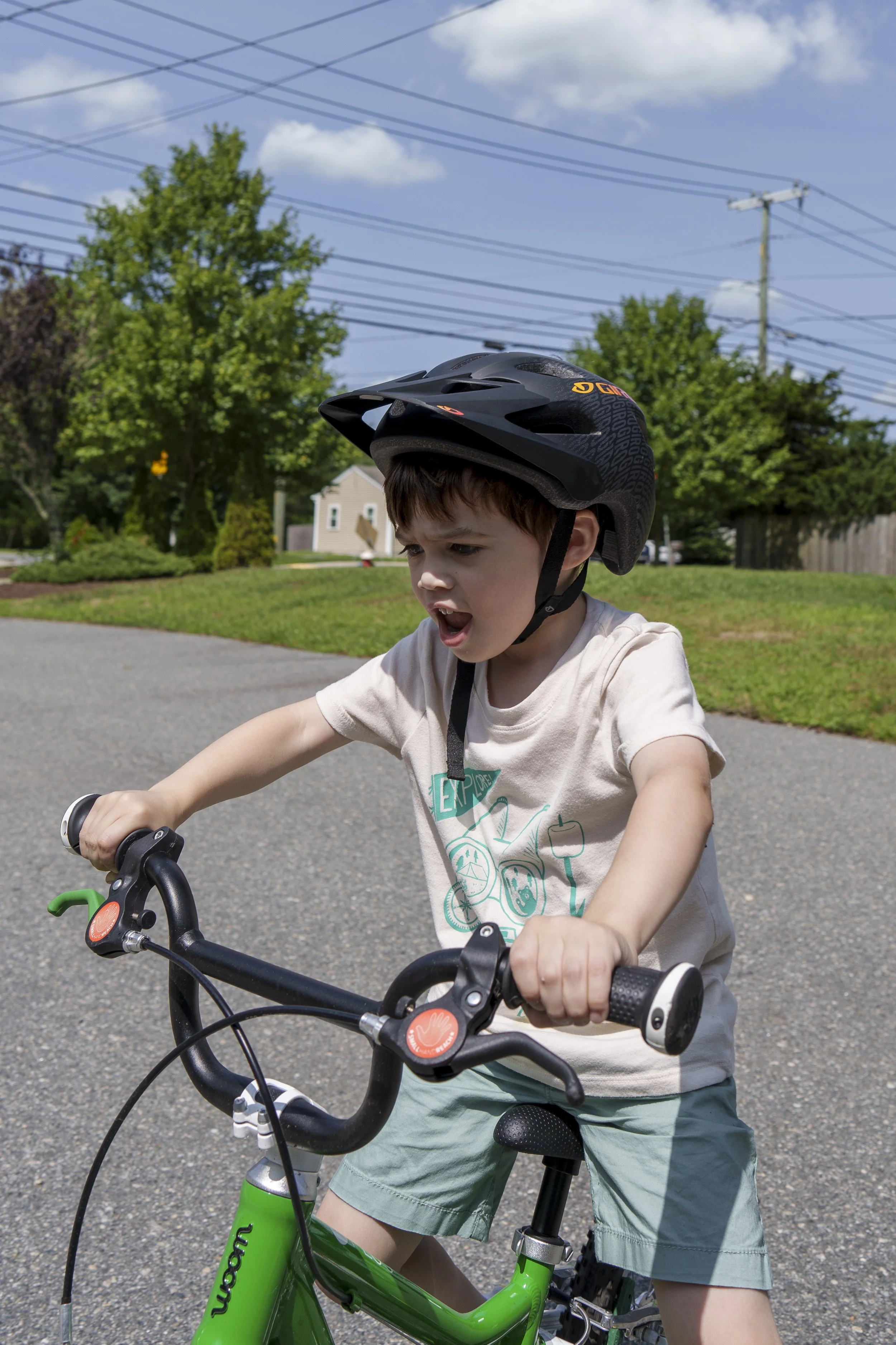 Riding balance bikes at the Cottage, 8/13