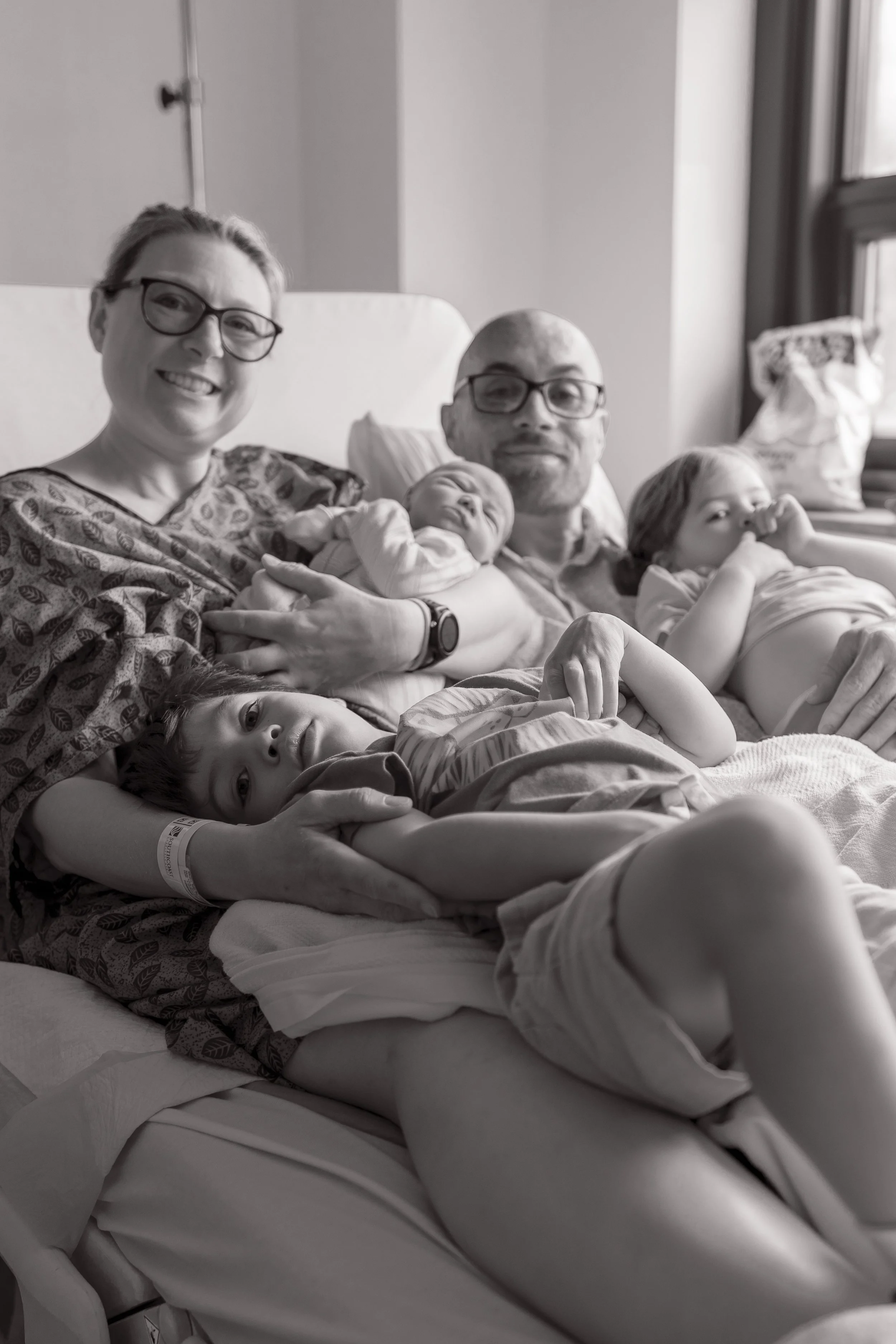 River and Eleanor meet Jack for the second time, 8/11 (we don't have pictures of their first meeting on 8/10, the day he was born, as there were too many people in the room and too little time)