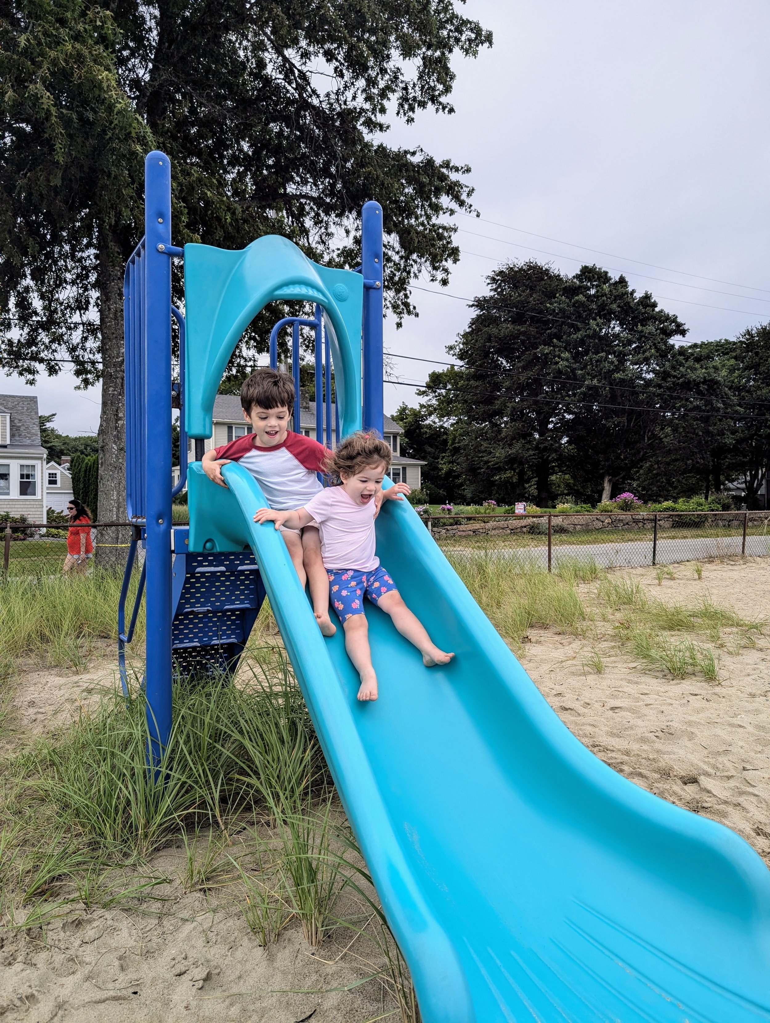 River and Eleanor at Town Beach playground, just after Dad's 45-minute run with the Indie Twin stroller, 8/19, crappy cell phone pic