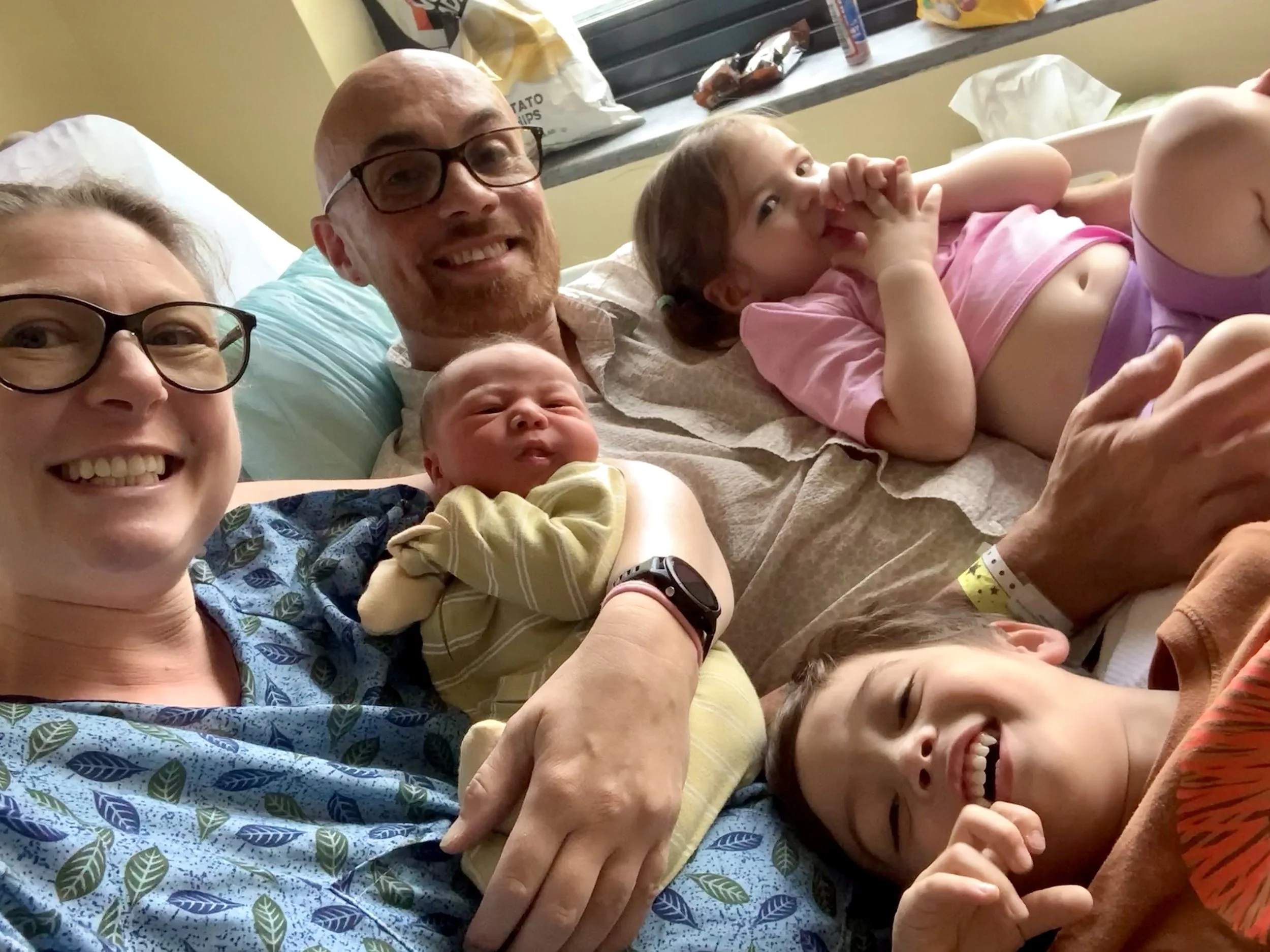 Family pic, 8/11, at Charlton, crappy cell phone pic