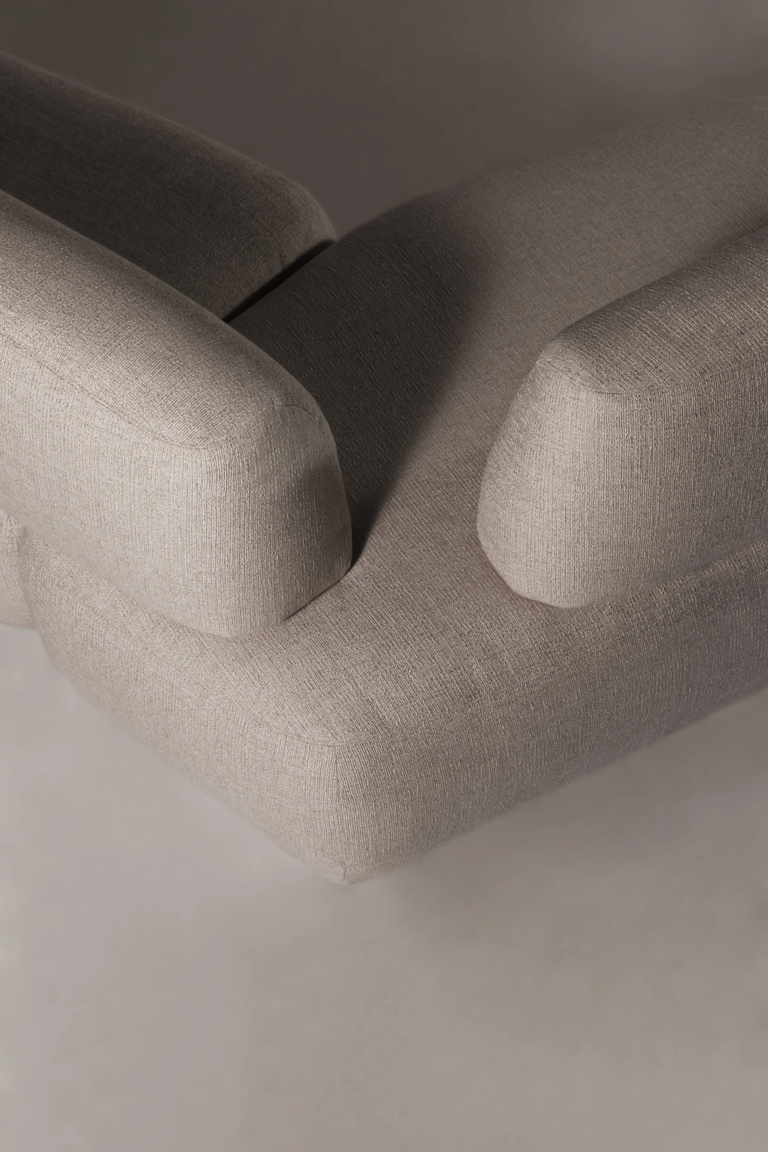 Detail view of the interlocking modular components of the Sekitei Sofa, mimicking naturally sculpted stones.