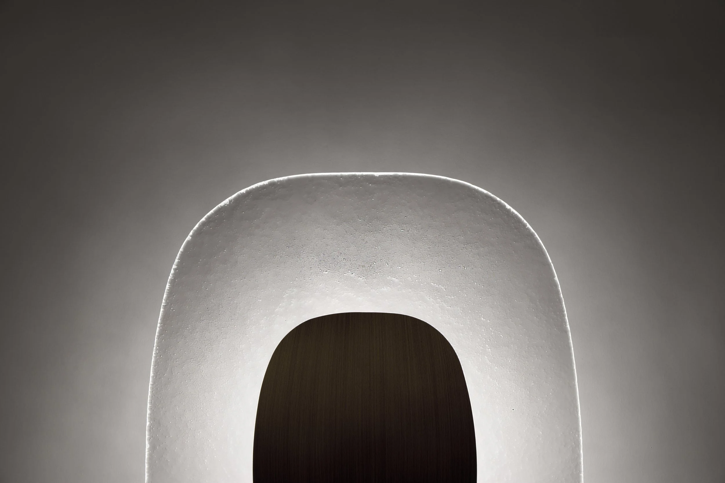 Detail of the caustic light effect projected by the Drop Light, evoking the organic expansion of a water ripple.