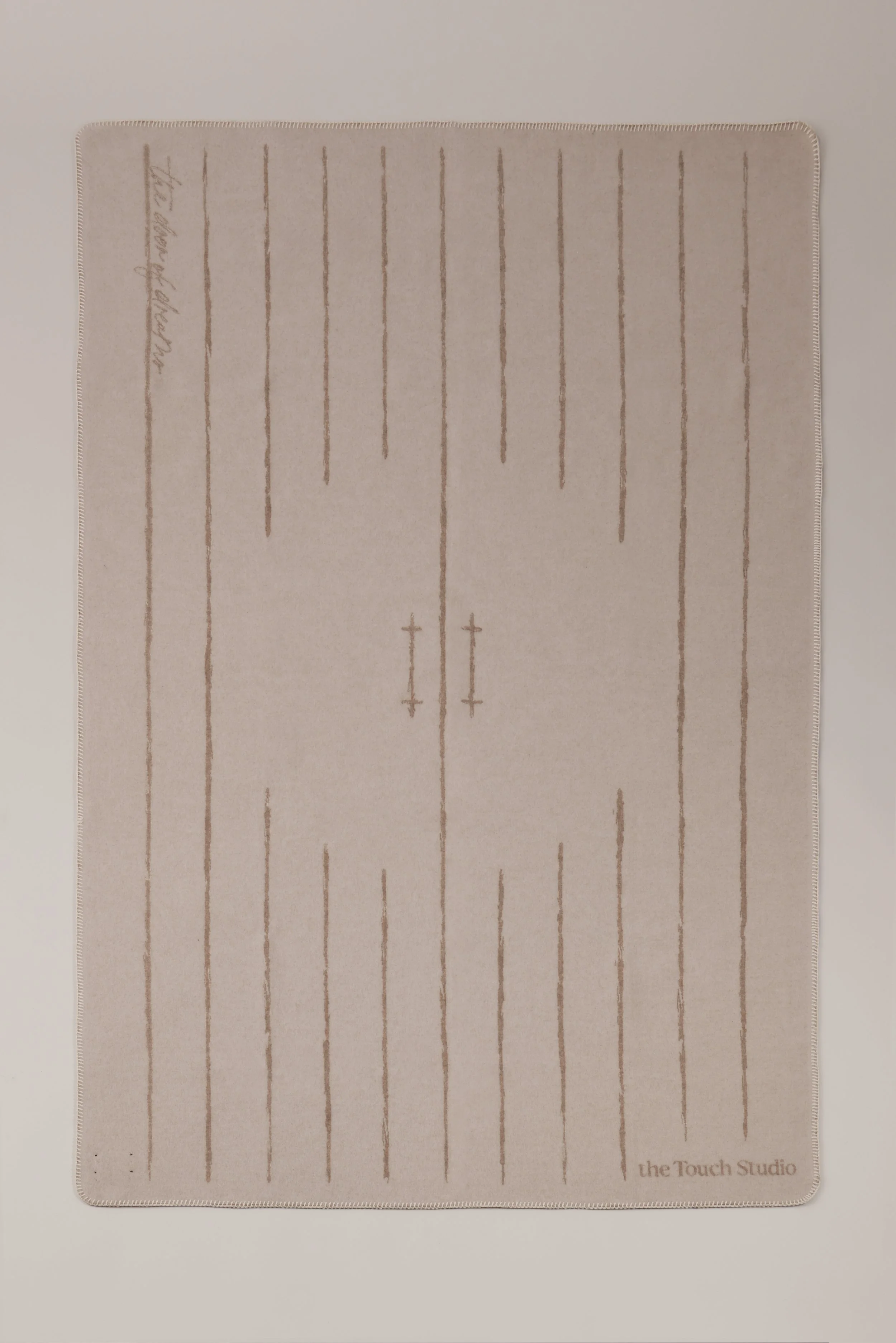 Vivion designer blanket with minimalist linear pattern, full view for contemporary interior design.