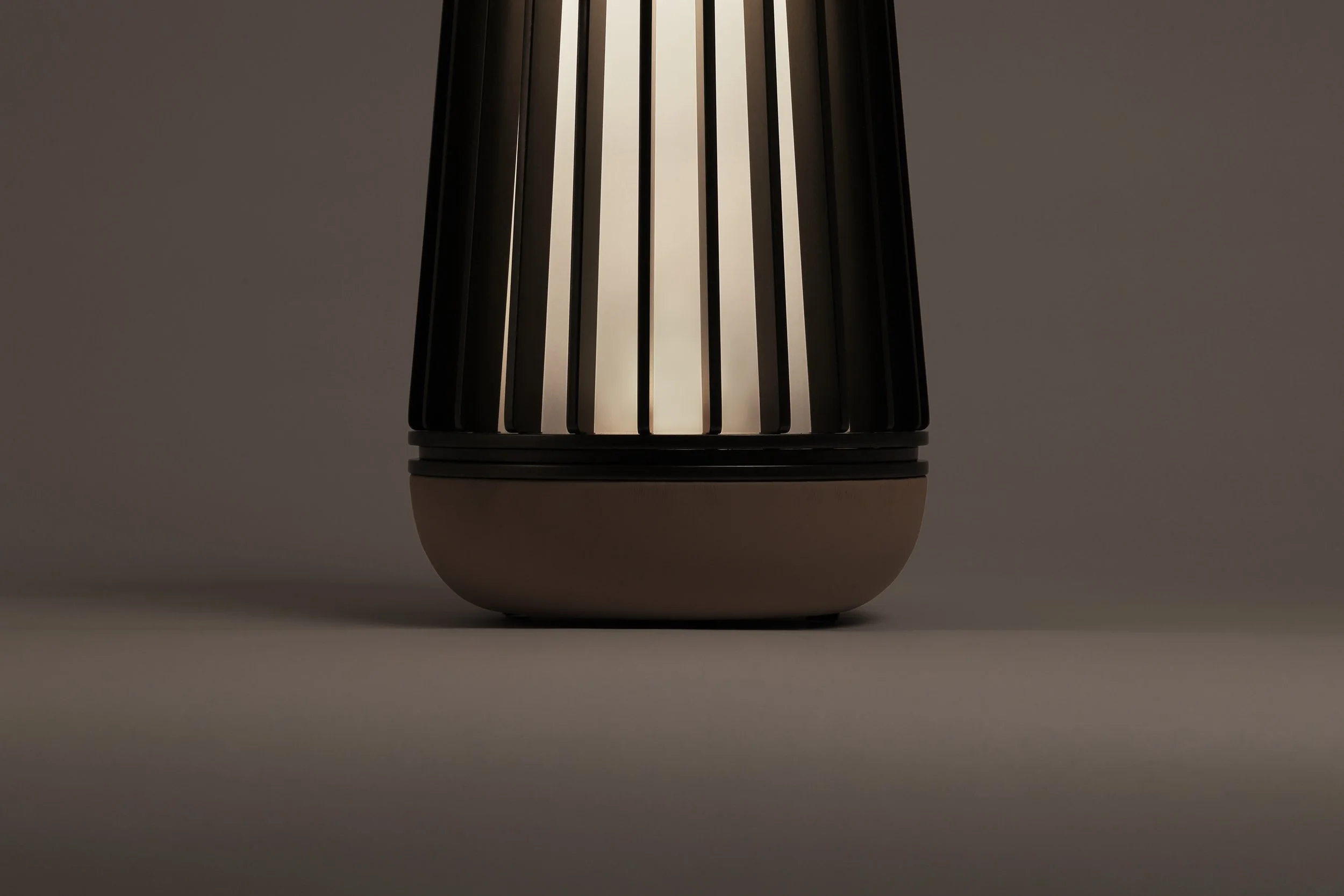 Full profile view of Dune Lantern in leather, brass and glass