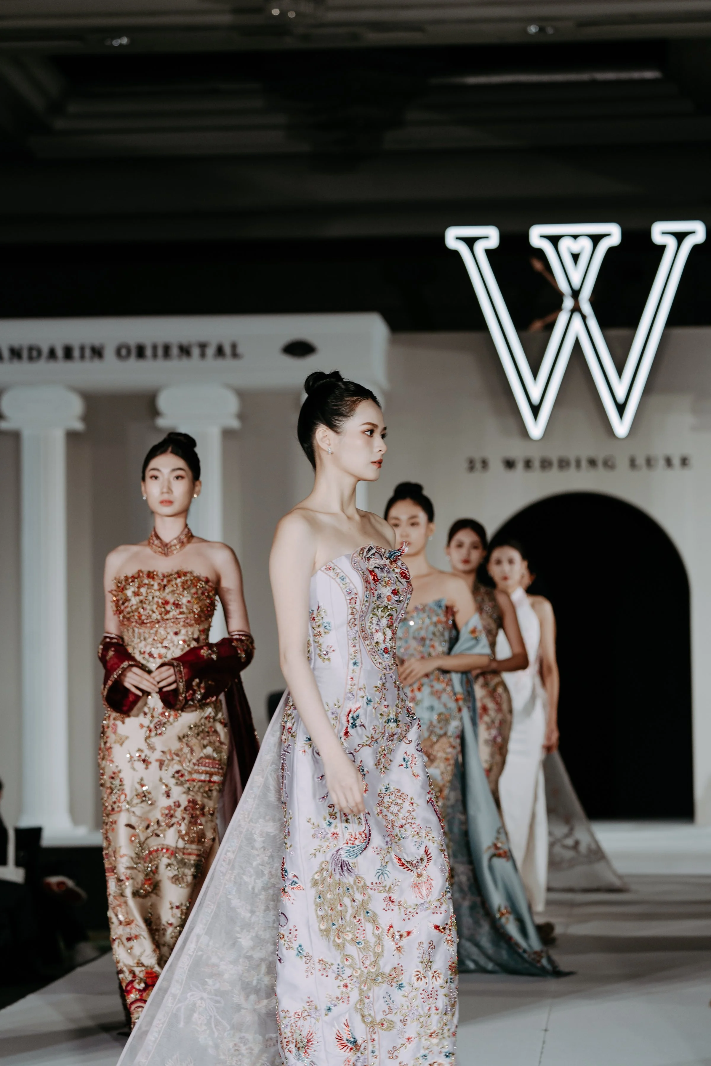 Brides in Sangjit couture gowns by 23 Wedding Luxe at Mandarin Oriental Kuala Lumpur