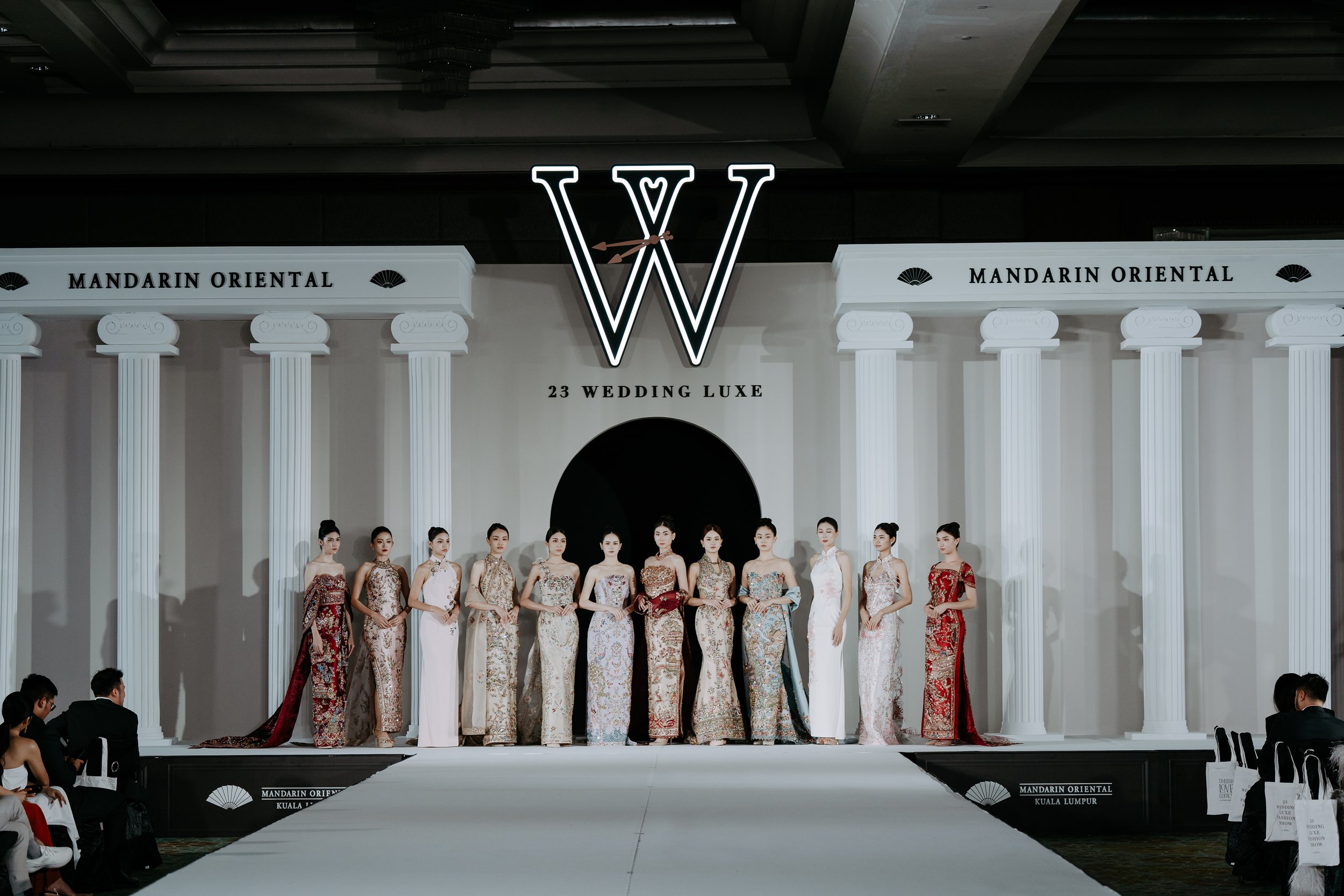 Models walking the runway in 23 Wedding Luxe Sangjit gowns at Mandarin Oriental Kuala Lumpur