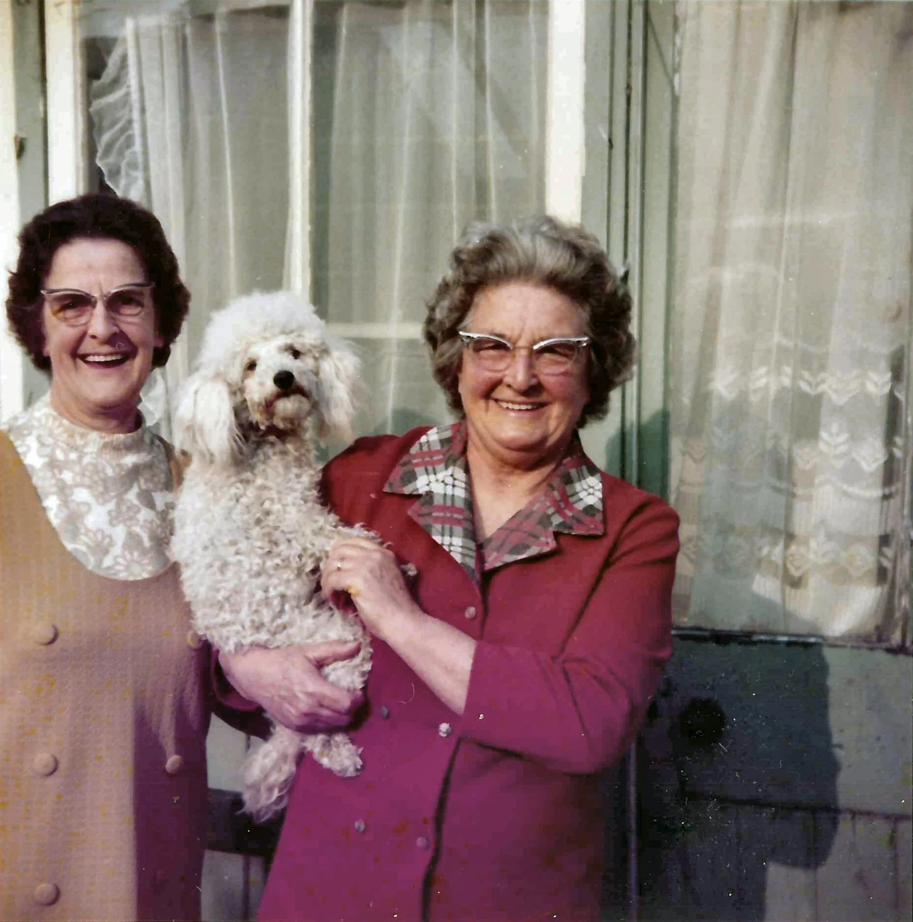 Grace Dorothy Jenner (born 1907) on left; and Florence Eveline Jenner (1901-1994) on right (holding her pet puddle, Penny) - Sisters