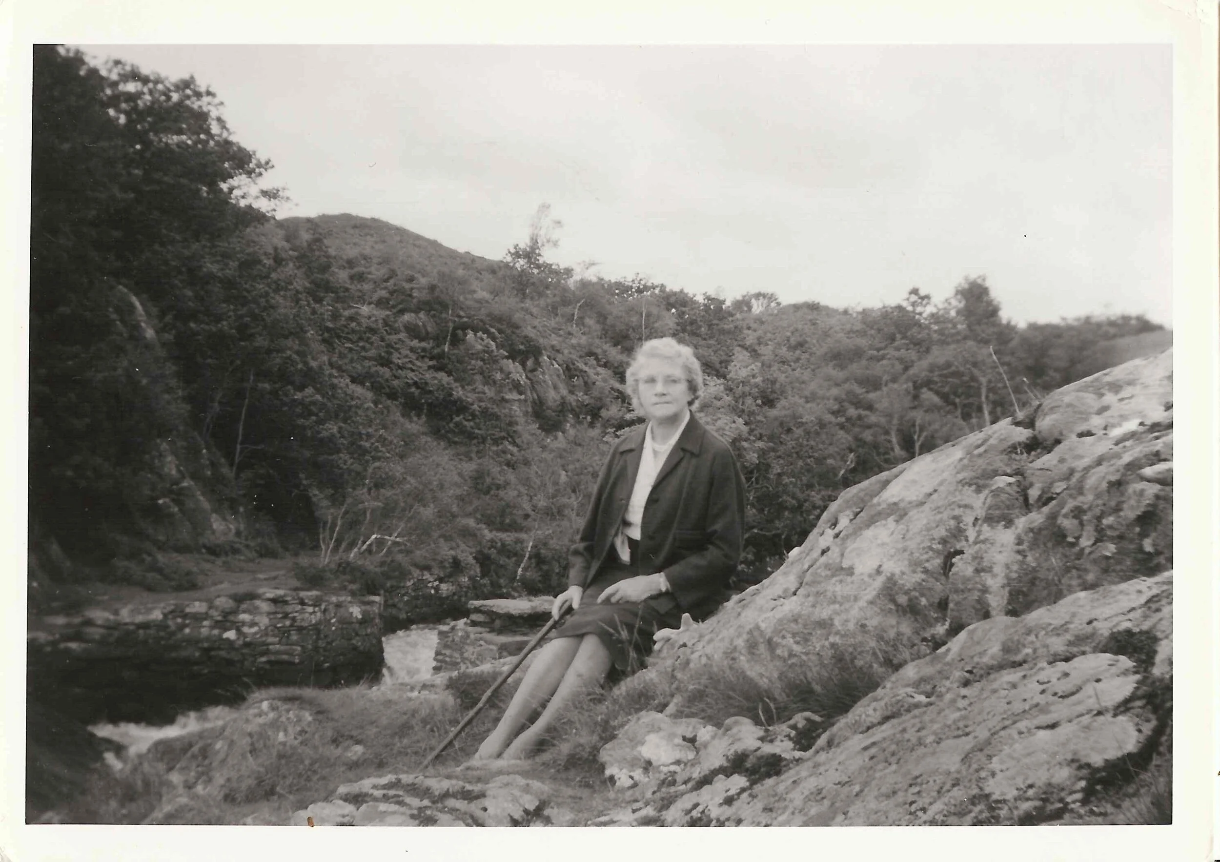 Gladys Kate Paul in Scotland by waterfall