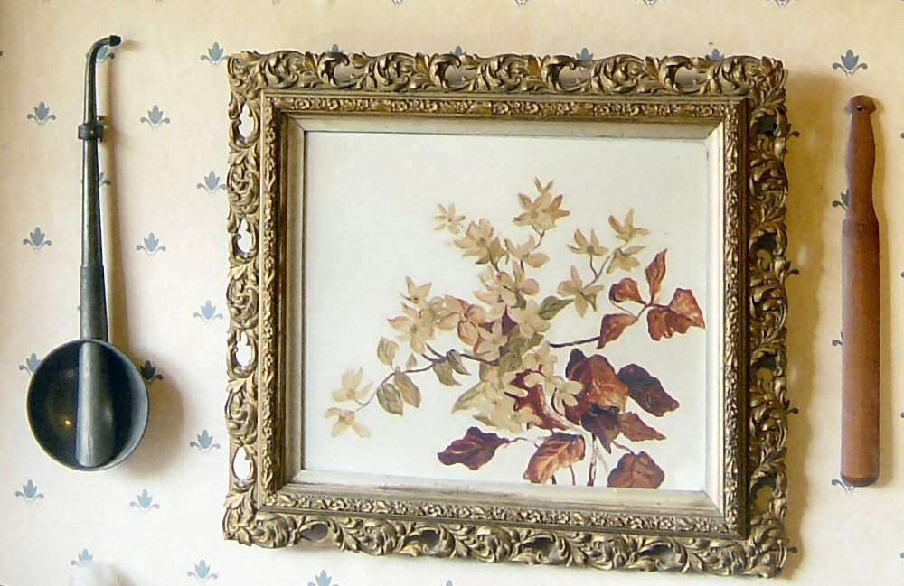 Oil painting done by Grand Pratt (Gertrude Rosa Burgess), plus (on either side)her hearing aid, and wooden letter opener.