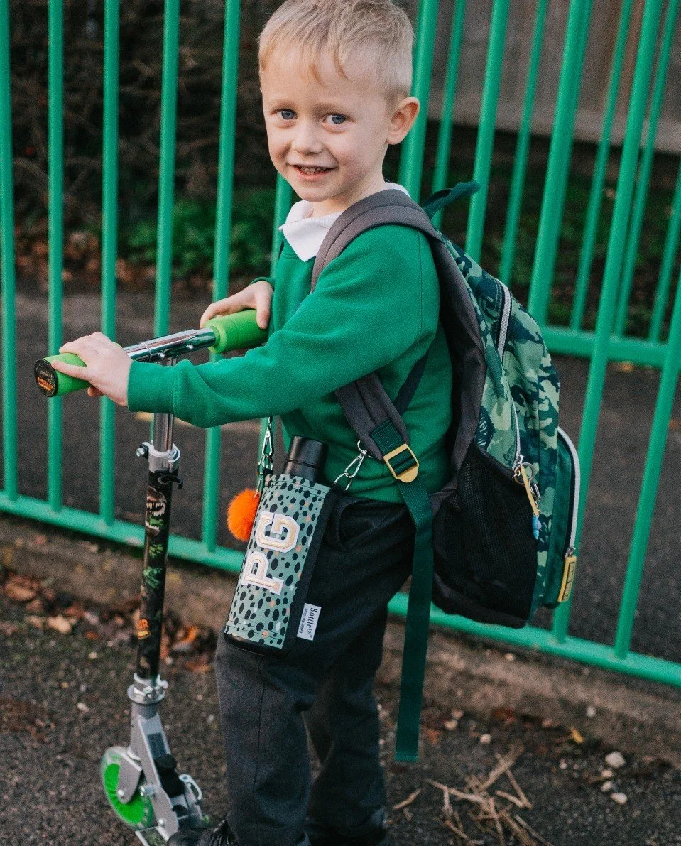 Half Term mode is: ON.School&rsquo;s out for Christmas! 🎄
Perfect timing for big adventures, park days, and scooter trips with their Bottle Soc in tow.

With its adjustable crossbody strap (made from recycled materials!), Bottle Soc keeps little exp