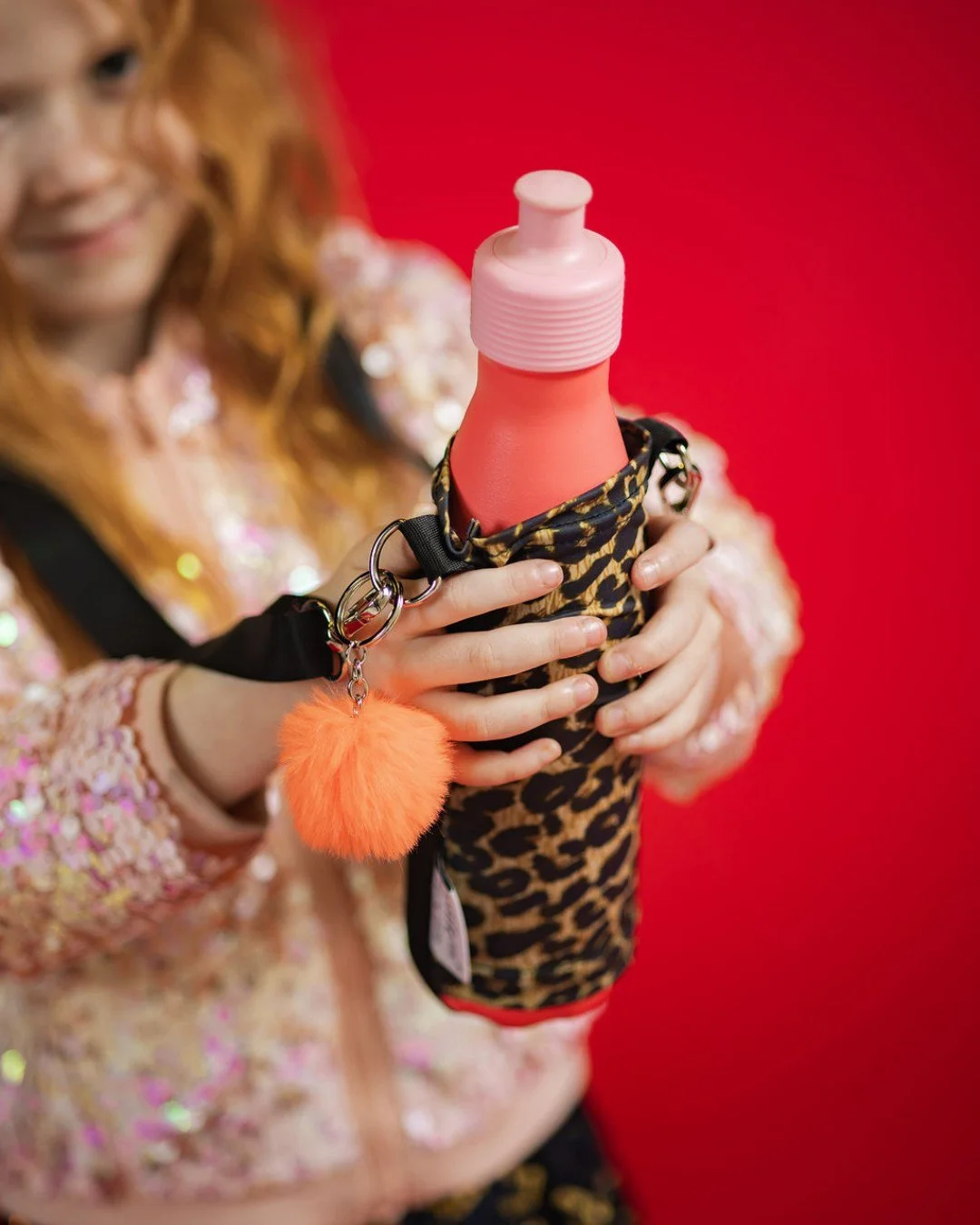 Our Leopard Print Bottle Soc is the hands-free, kid-proof water bottle holder loved by parents and little adventurers. Stylish, practical and impossible to lose.

If your child forgets their water bottle everywhere (school, dance class, playground&he