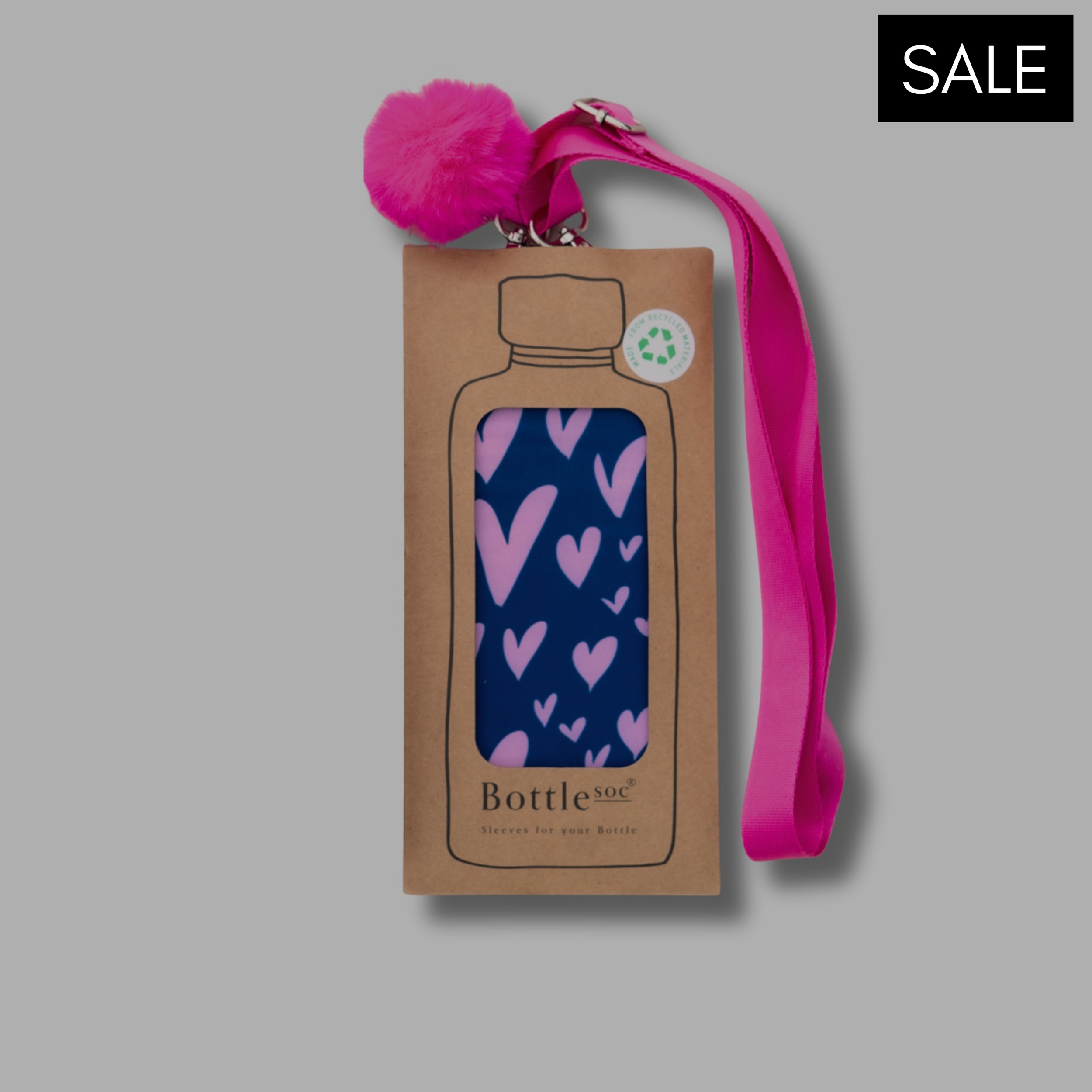 Pink heart pattern on dark blue Bottlesoc water bottle holder with strap