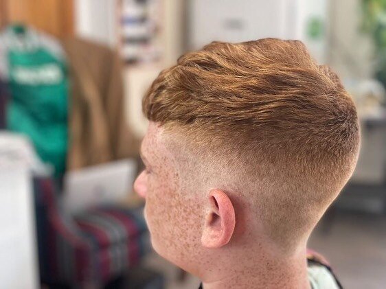 Mid fade with a layered texture top! We always are up to date with the latest kids haircut trends! @ap11_spamz looking sharp