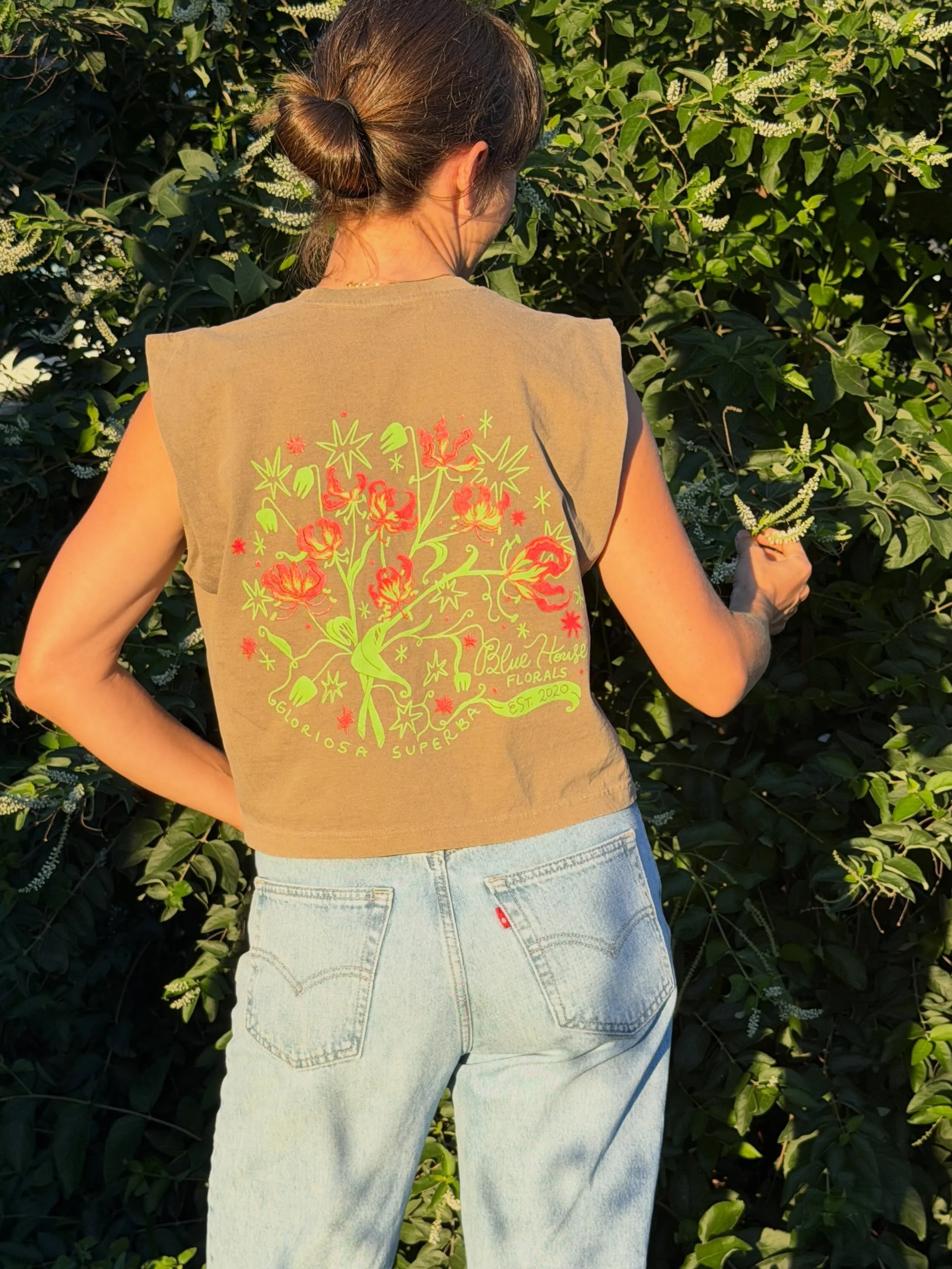 My new fav tee! I don&rsquo;t know why it took 7 years to have merch. But it was worth the wait! 💃🏻

Gloriosa Superba aka Flame Lily is a reminder that Florida Flowers contain our own unique beauty 🔥 Hot, fiery, and wild. 

Thank you thank you to 