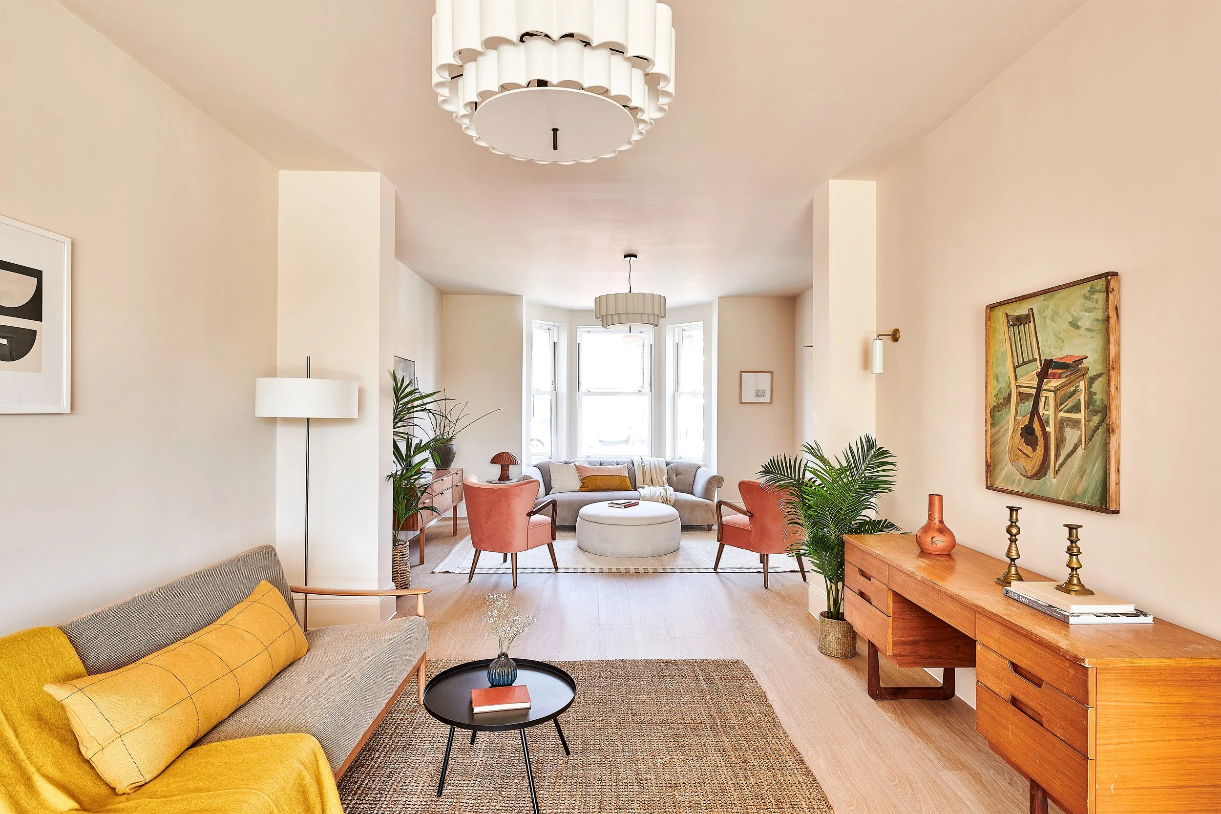 Living room interior design in Victorian terrace renovation with mid century styling. 