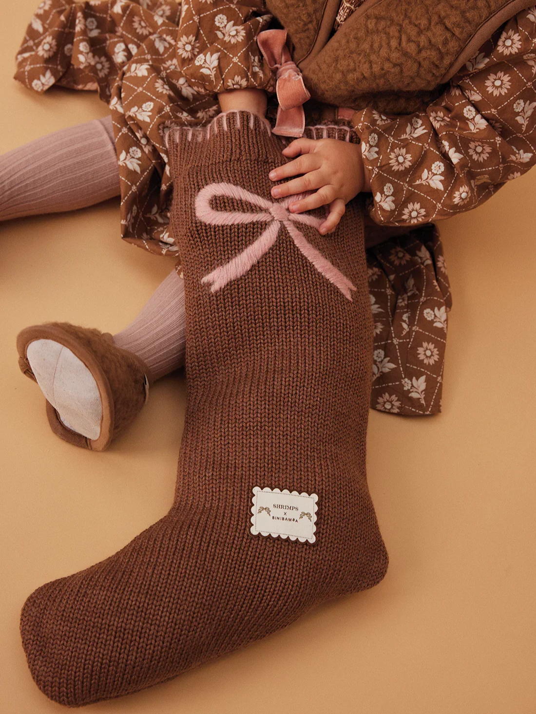  Shrimps x Bini Bini Bow Stocking - £39  
Merino wool stocking that looks so snuggly you'll want to wear it when it's not filled with gifts