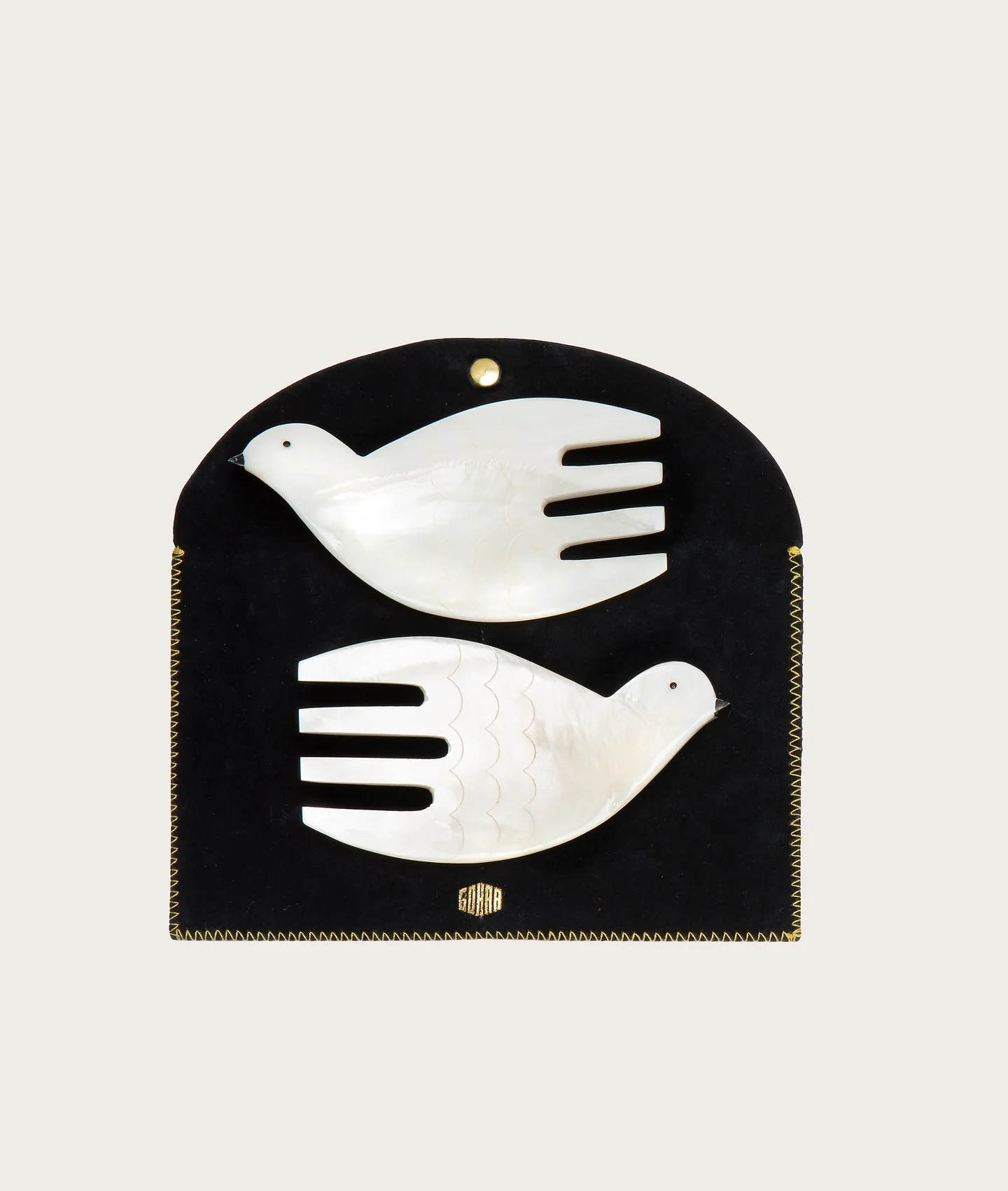  Gohar World Salad Servers - $158  
Hand-carved mother-of-pearl servers presented in a velvet pouch, I mean how utterly fabulous