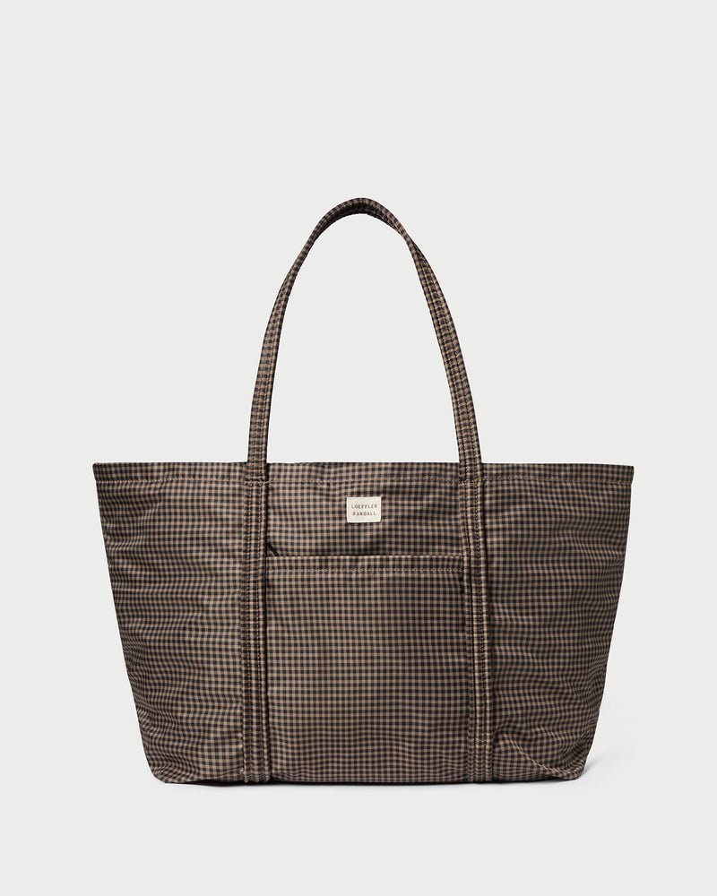  Loeffler Randall Dina Travel Tote - $195  
My super chic friend   India  is using this tote as her nappy bag, the material is practical and can be used long after the nappy years