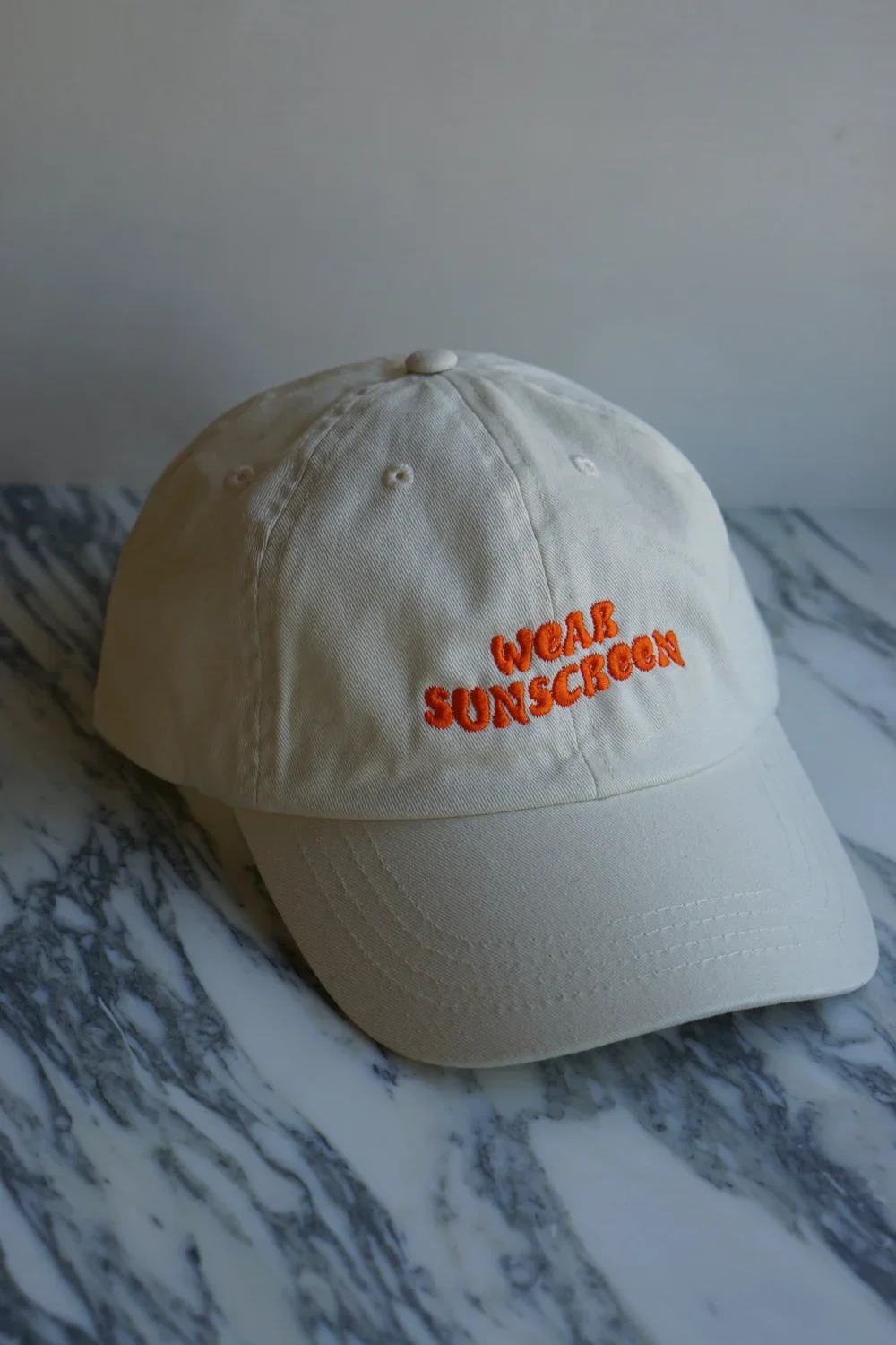  Studio Bust Wear Sunscreen Cap - £35  
Our bestselling cap for a reason. To be worn all year round please! 