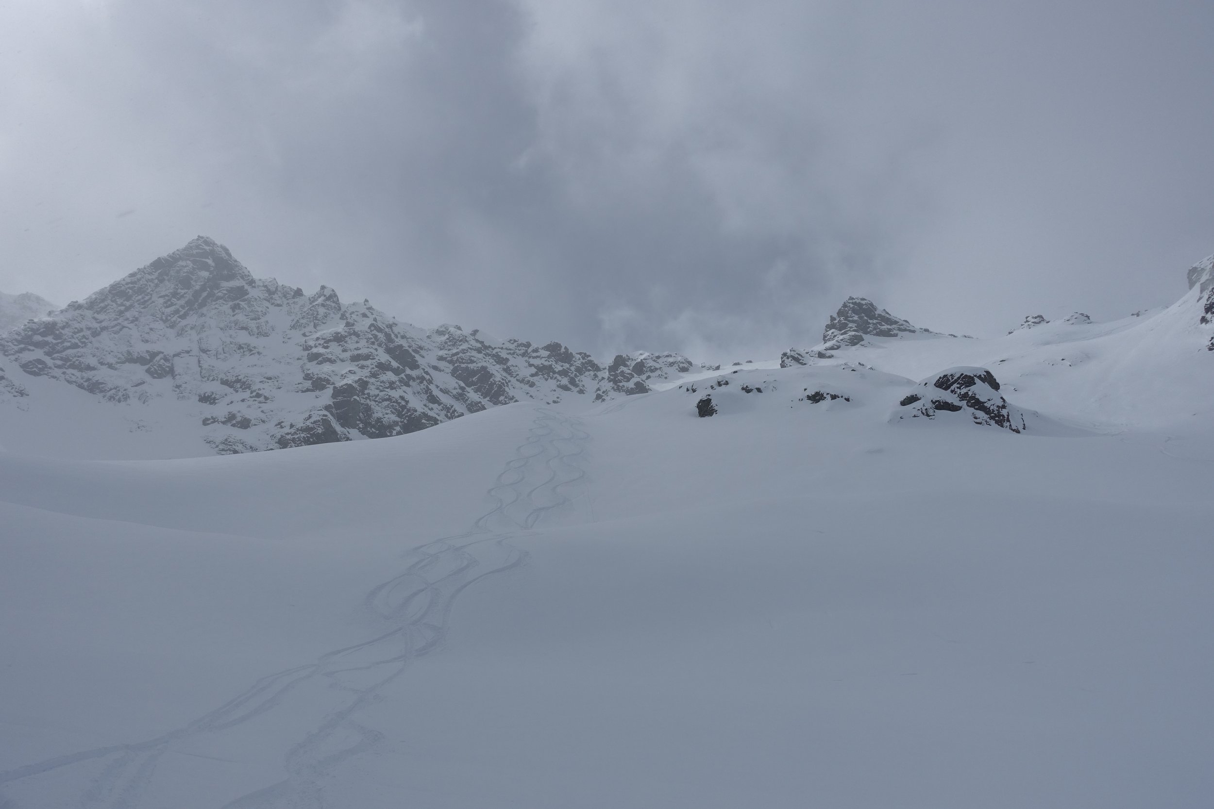 Ski lines at the bottom of Scorpion