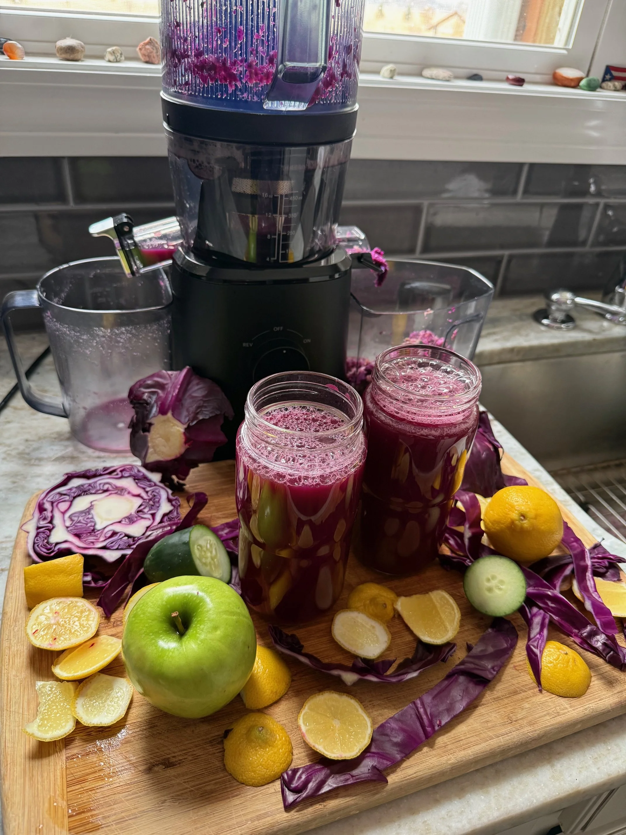 Iron support juice made with purple cabbage green apples lemon and cucumber for low ferritin in perimenopause.