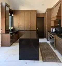 modern kitchen, walnut cabinets, honed black quarts