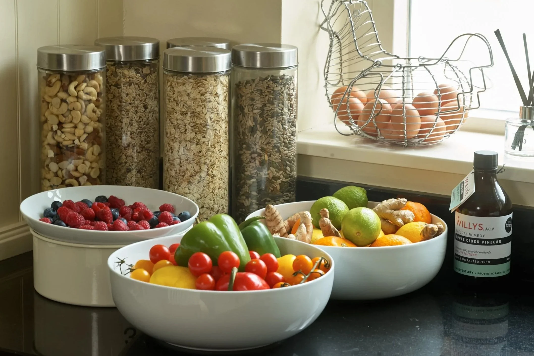 bowls of fruits, vegetables and grains.