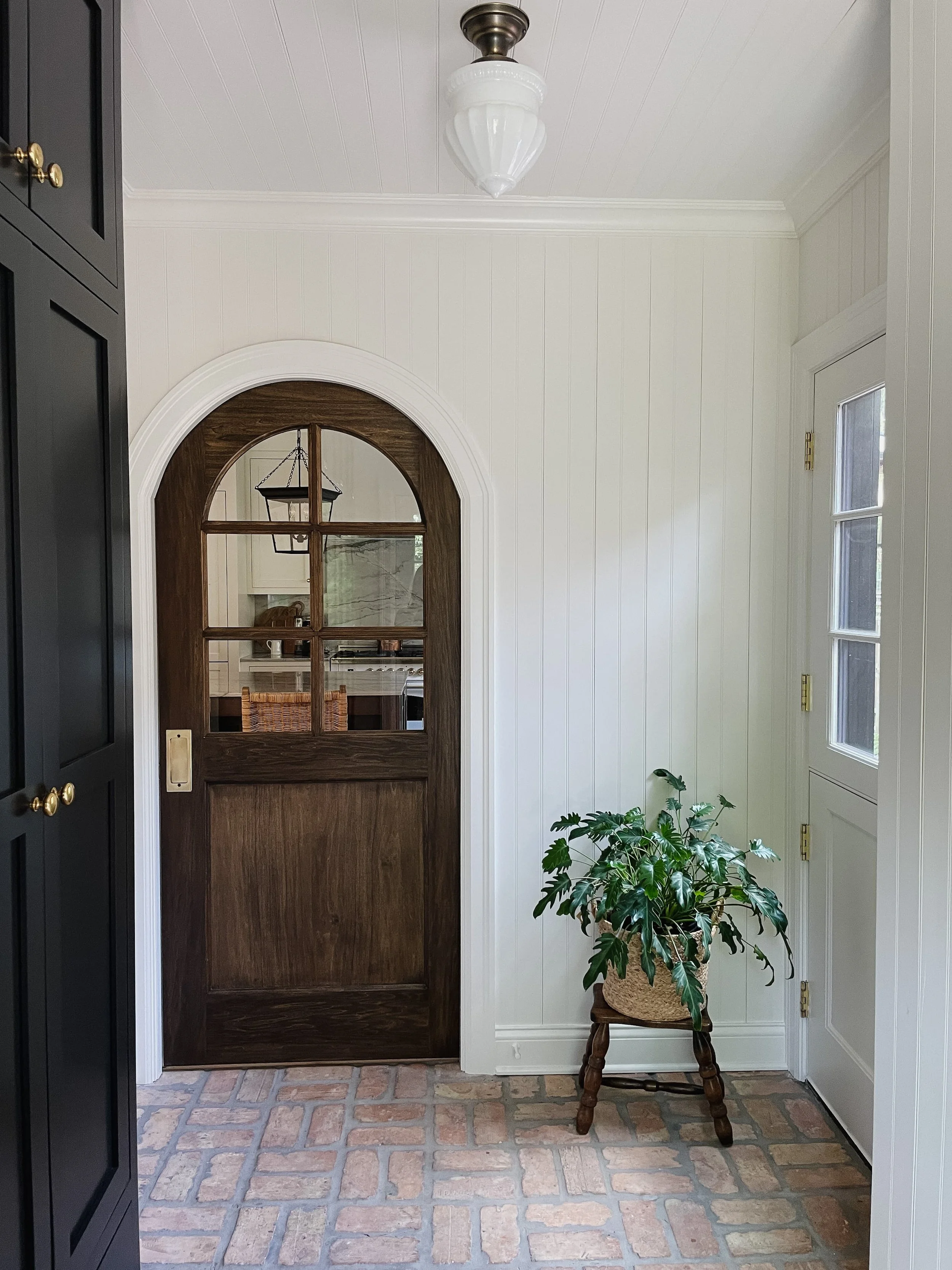 Elegant Arched Pocket Door Bathroom Design Ideas