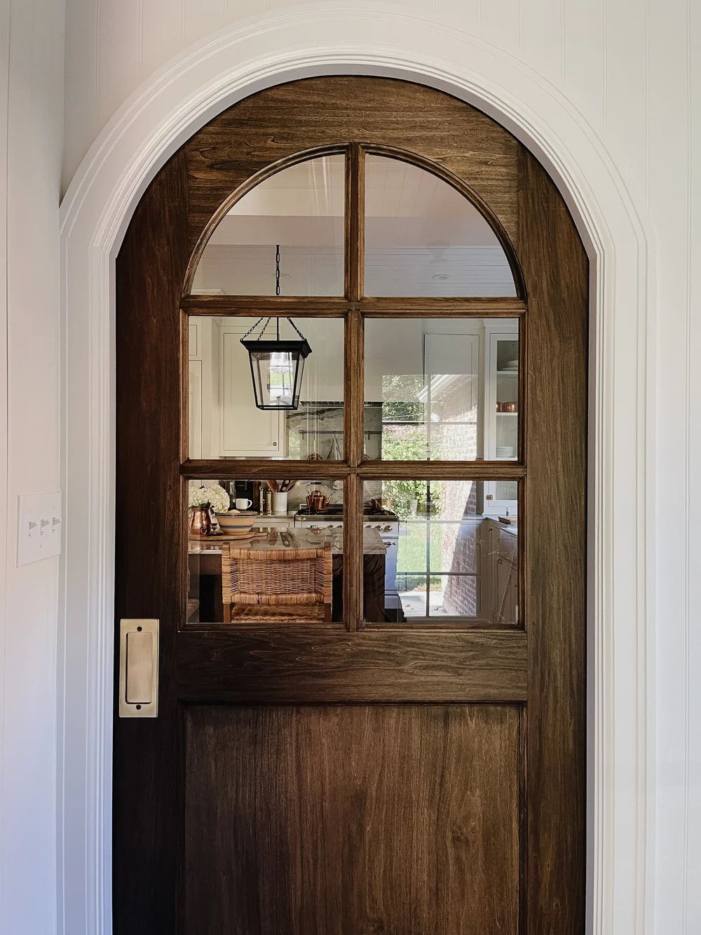 All The Details on Our (Faux) Arched Pocket Door We're the Whites