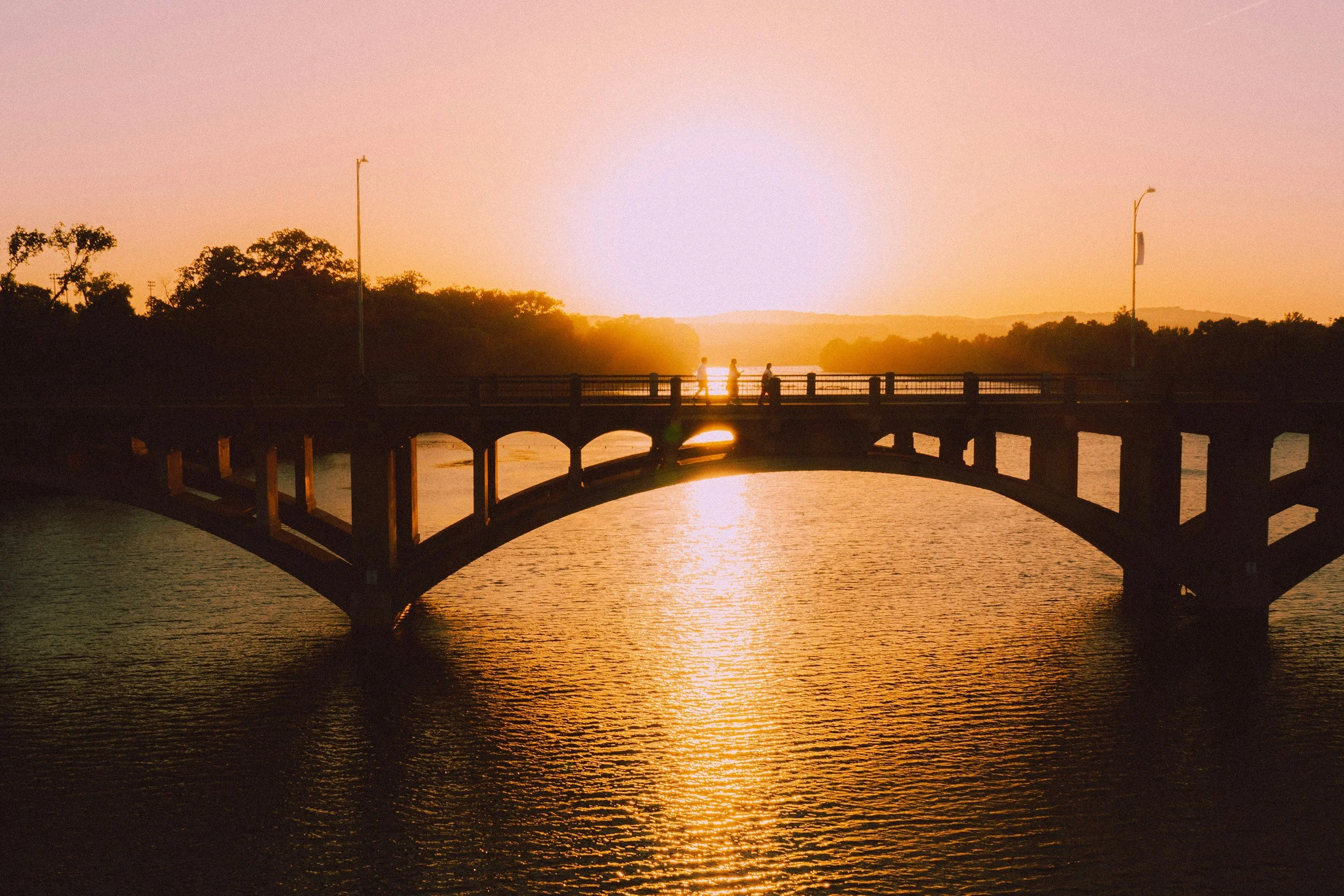 Austin Texas skyline with Lady Bird Lake at sunset