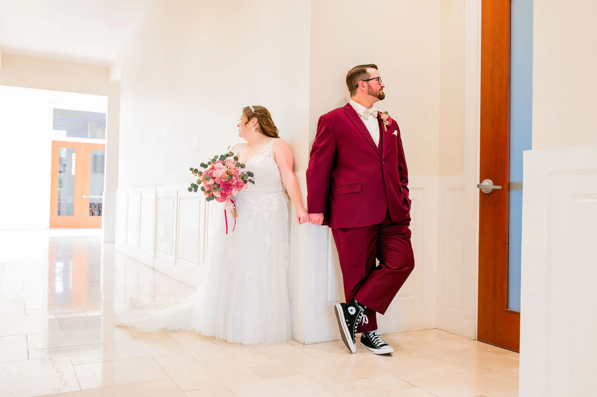 Wide shot of wedding couple doing their First Touch at Wedgewood Weddings Colby Falls, Gilbert Arizona