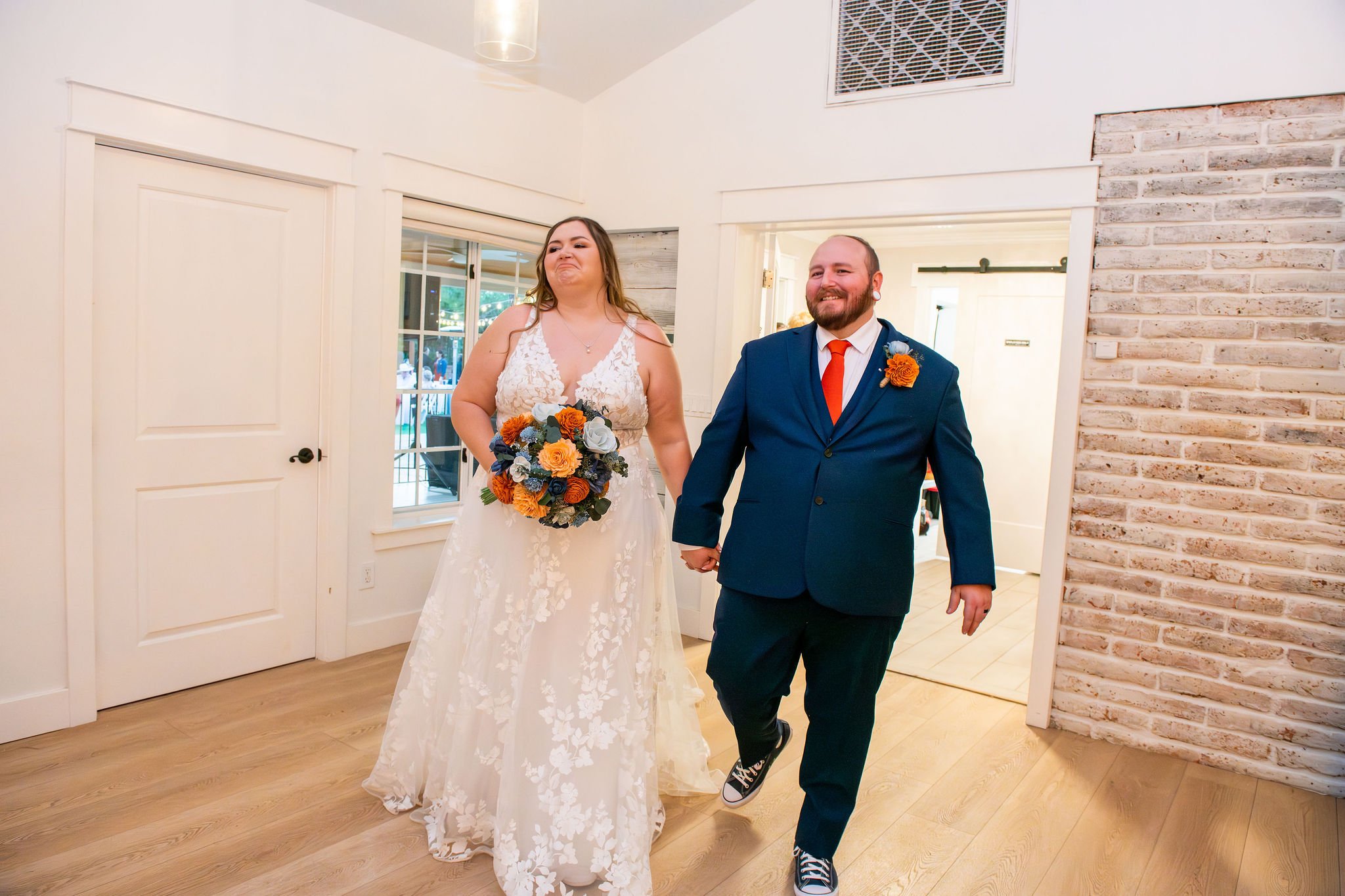 Bride and Groom seeing their reception hall at the Farmhouse at Schnepf Farms in Queen Creek, Arizona