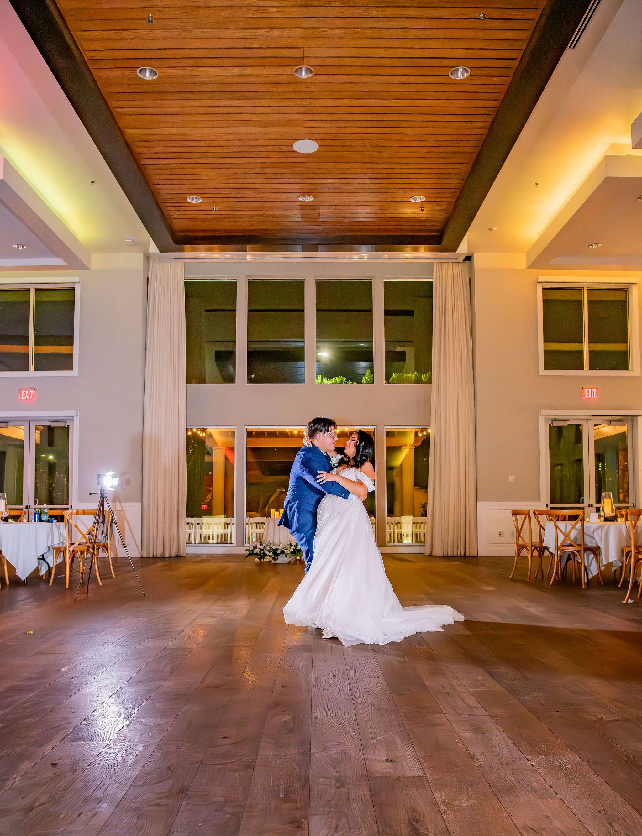 Groom dips Bride during their intimate private dance at Colby Falls in Gilbert, Arizona