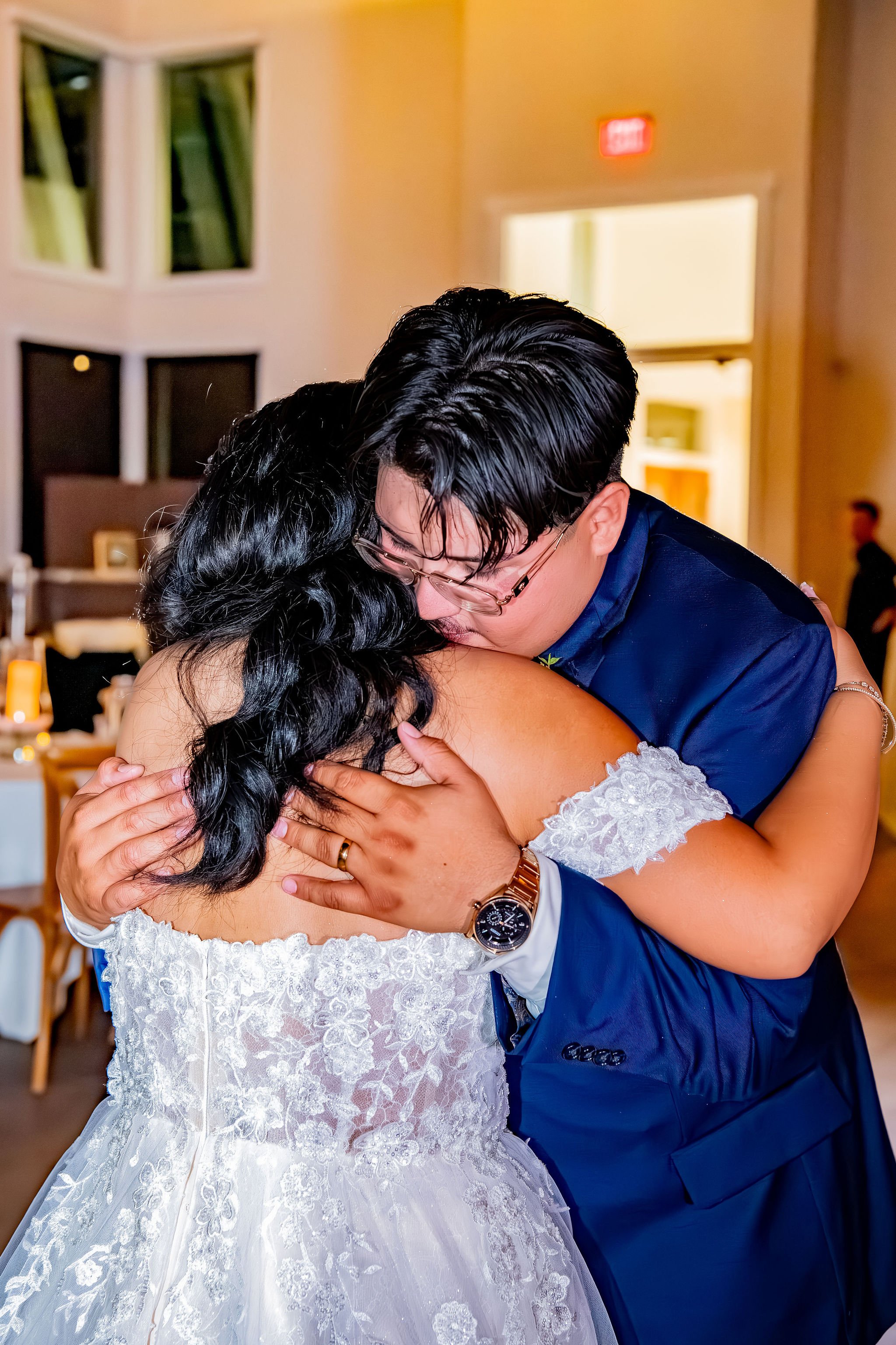 Groom holds bride close during intimate private last dance at Colby Falls by Wedgewood Weddings in Gilbert, Arizona