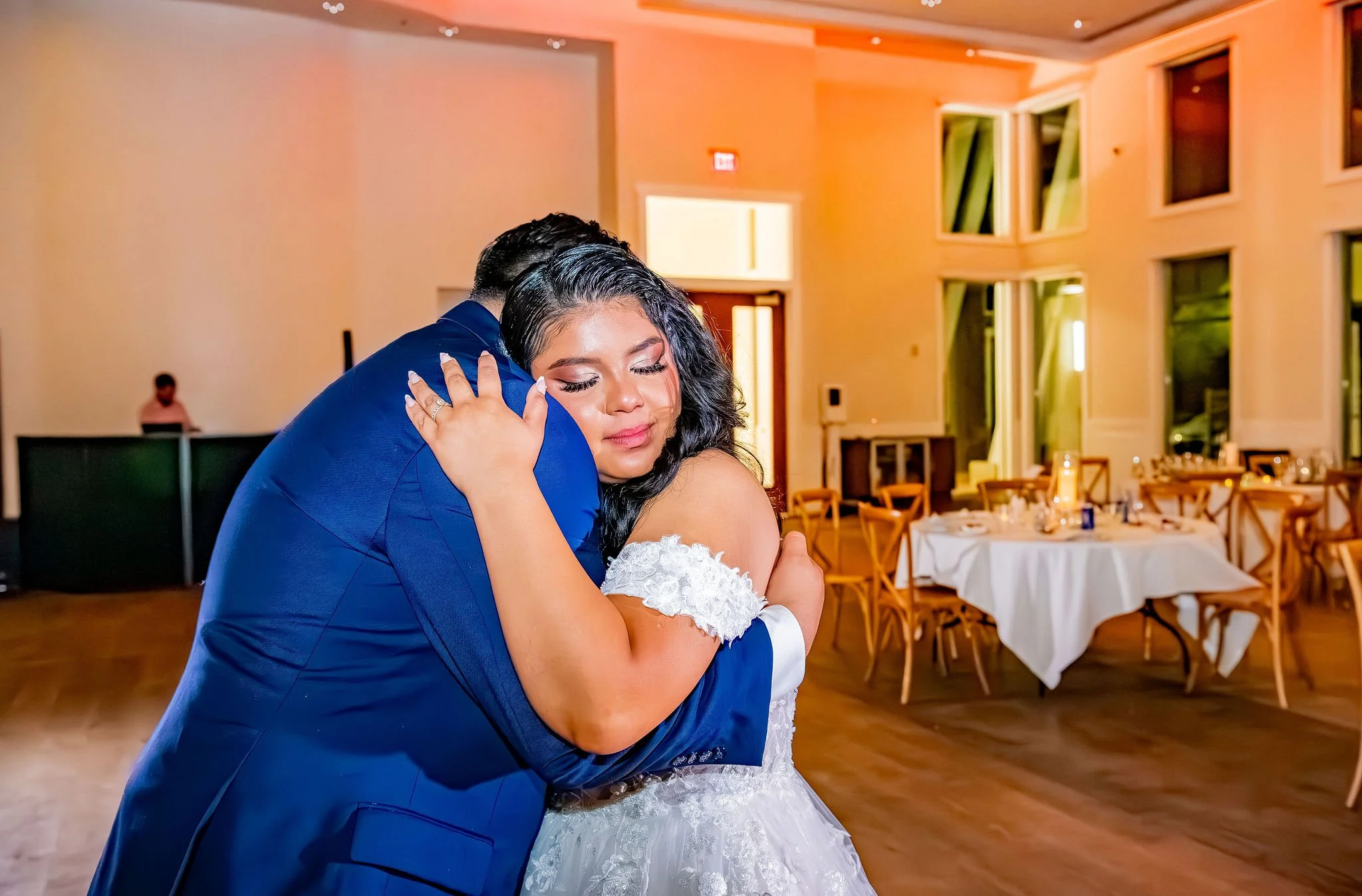 Bride emotionally holds the Groom close during their intimate private last dance at Wedgewood Weddings Colby Falls in Gilbert, Arizona