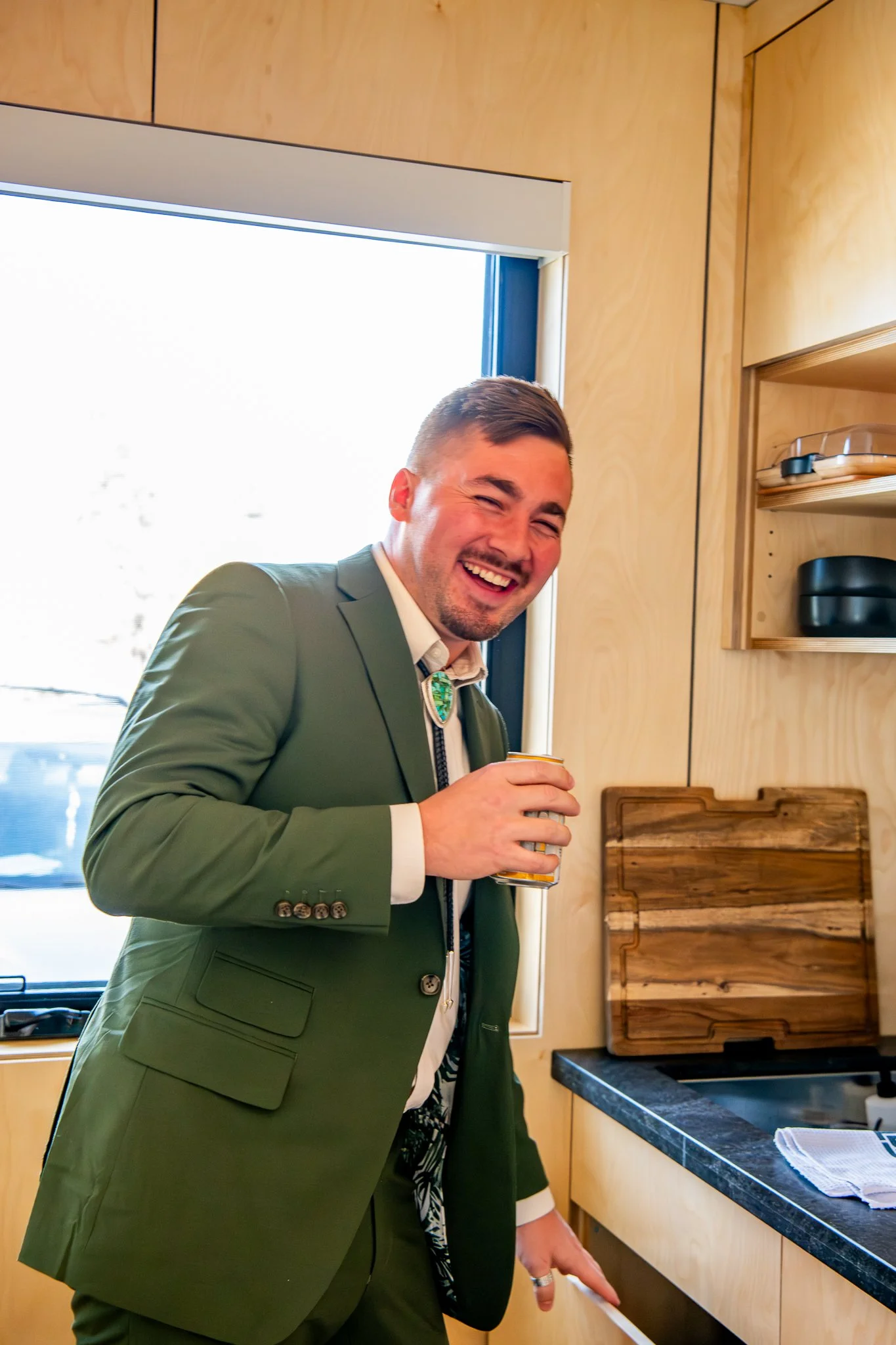 A fun moment with the groom before their destination adventure elopement begins in Prescott, Arizona