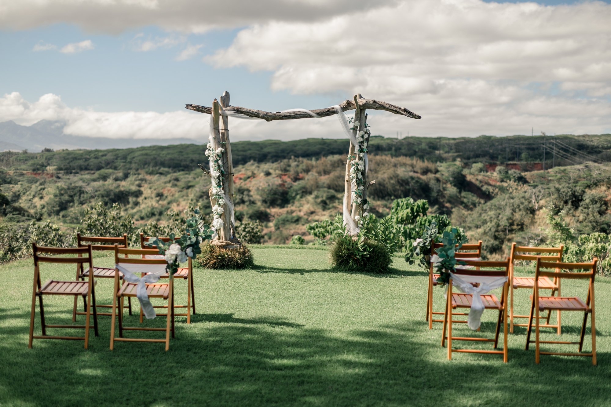 Decorated arbor and chairs.jpg