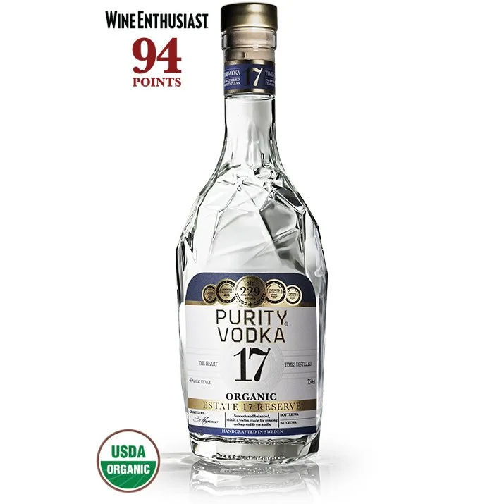 A bottle of Purity Vodka with a cracked glass design, labeled as organic and 17 years old, with a USDA organic certification badge at the bottom left.