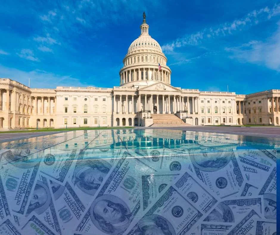 US Congress building overlooking a river of money flowing away from it. This represents the tax savings available to Ultra High Net Worth families if the right questions are asked in their estate planning and tax preparation.